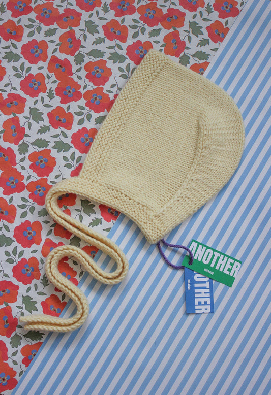 Hand-knitted Adult Bow Tie Bonnet hat in Light Yellow