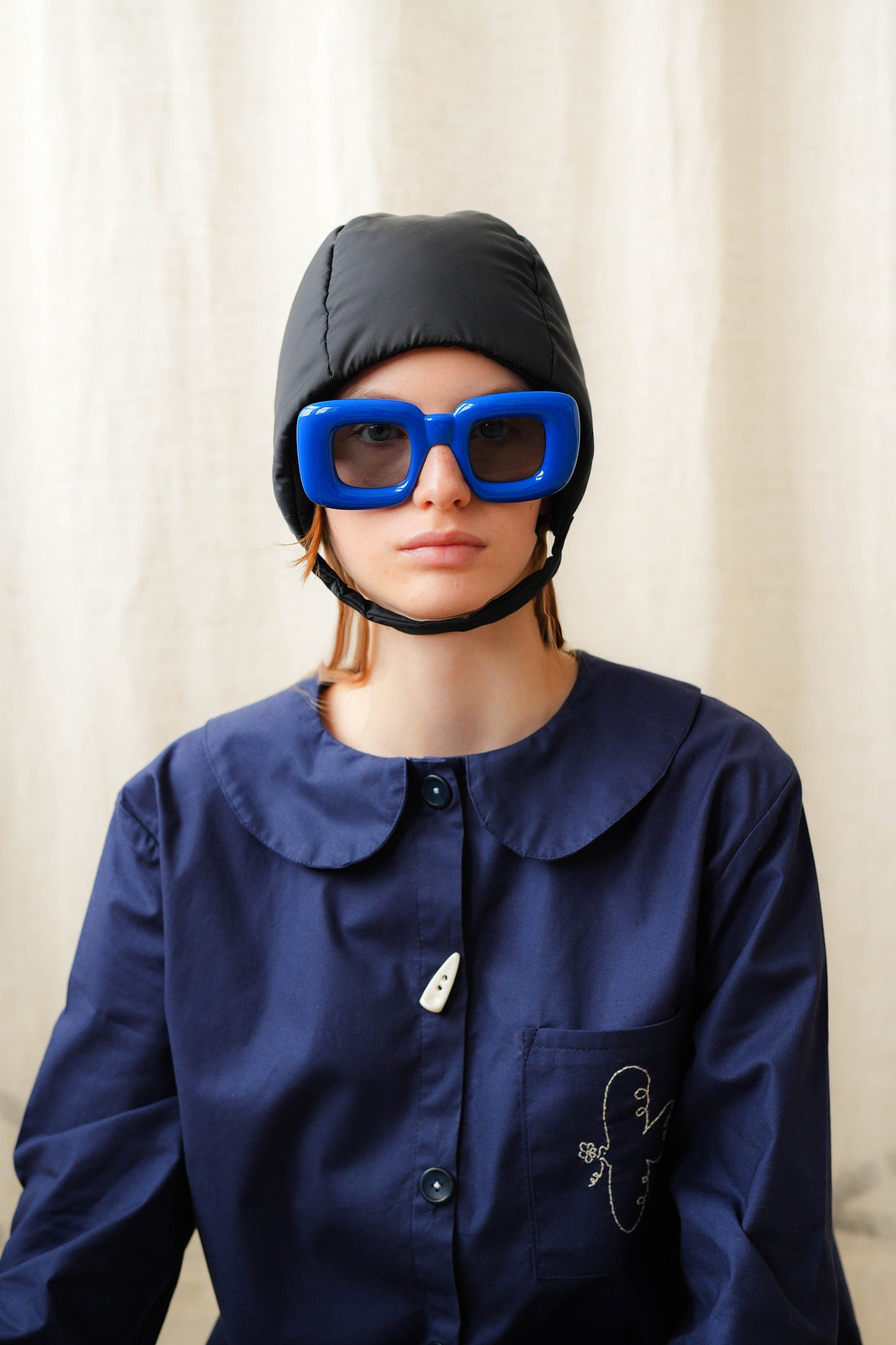 Pillow Puffer Quilted Aviator Helmet Cap Bonnet on a button in Black