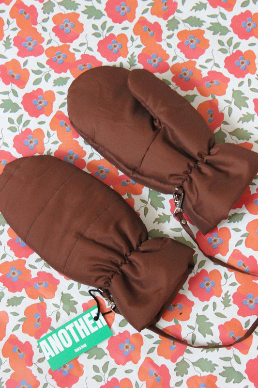 Puffer Mittens on Strings in Brown