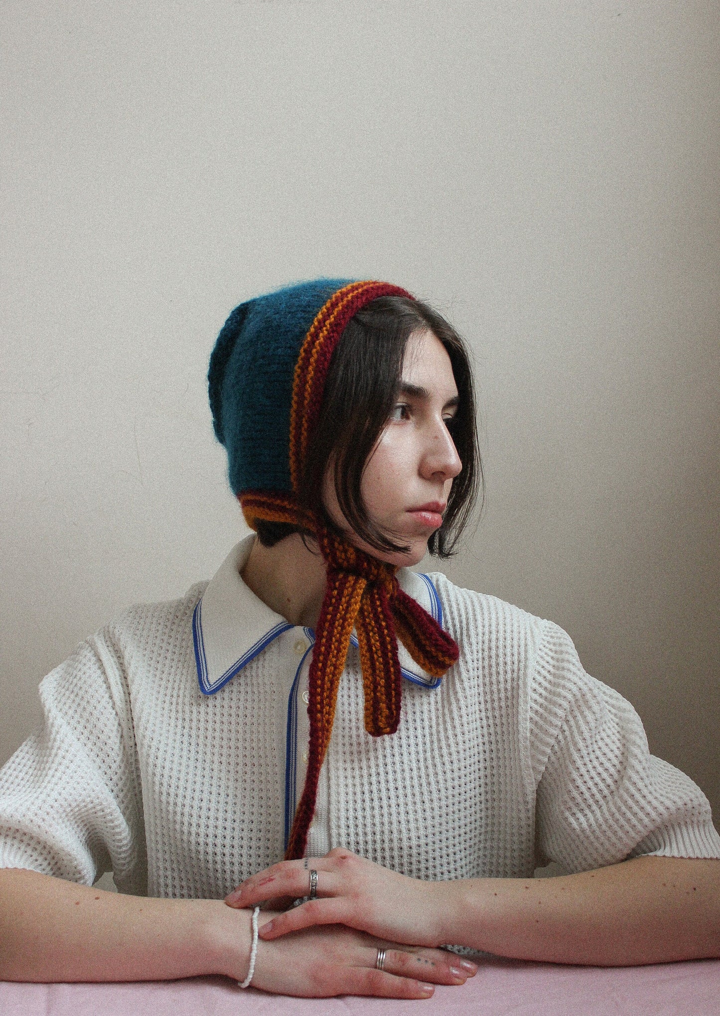 Hand-knitted Adult Bow Tie Bonnet hat in dull multicolor