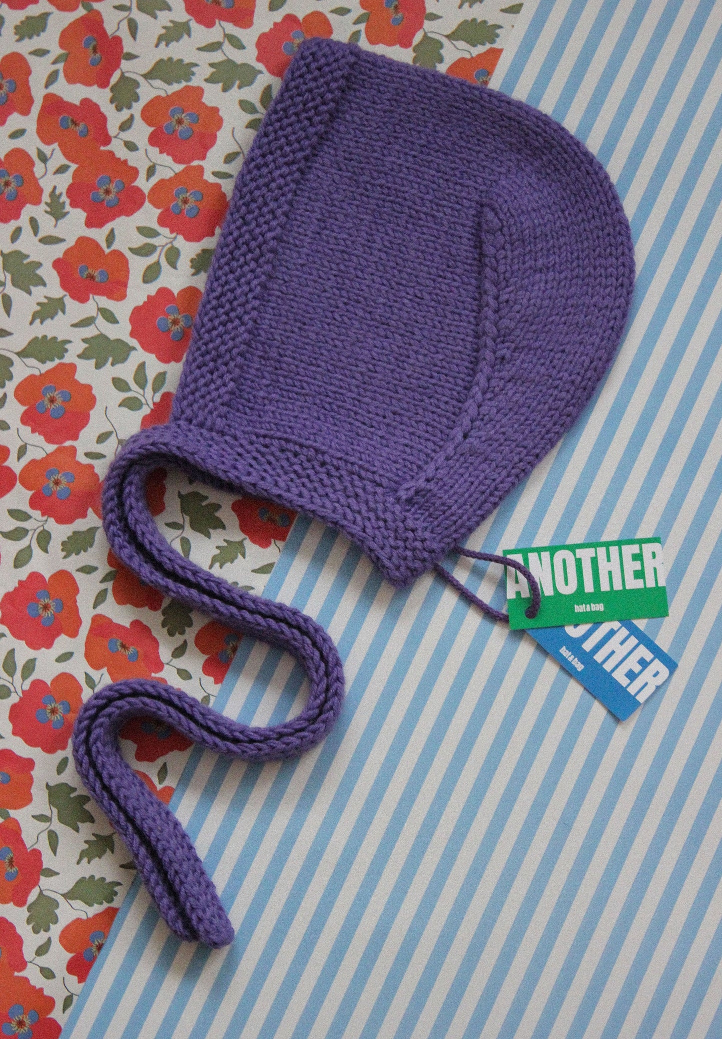 Hand-knitted Adult Bow Tie Bonnet hat in Purple