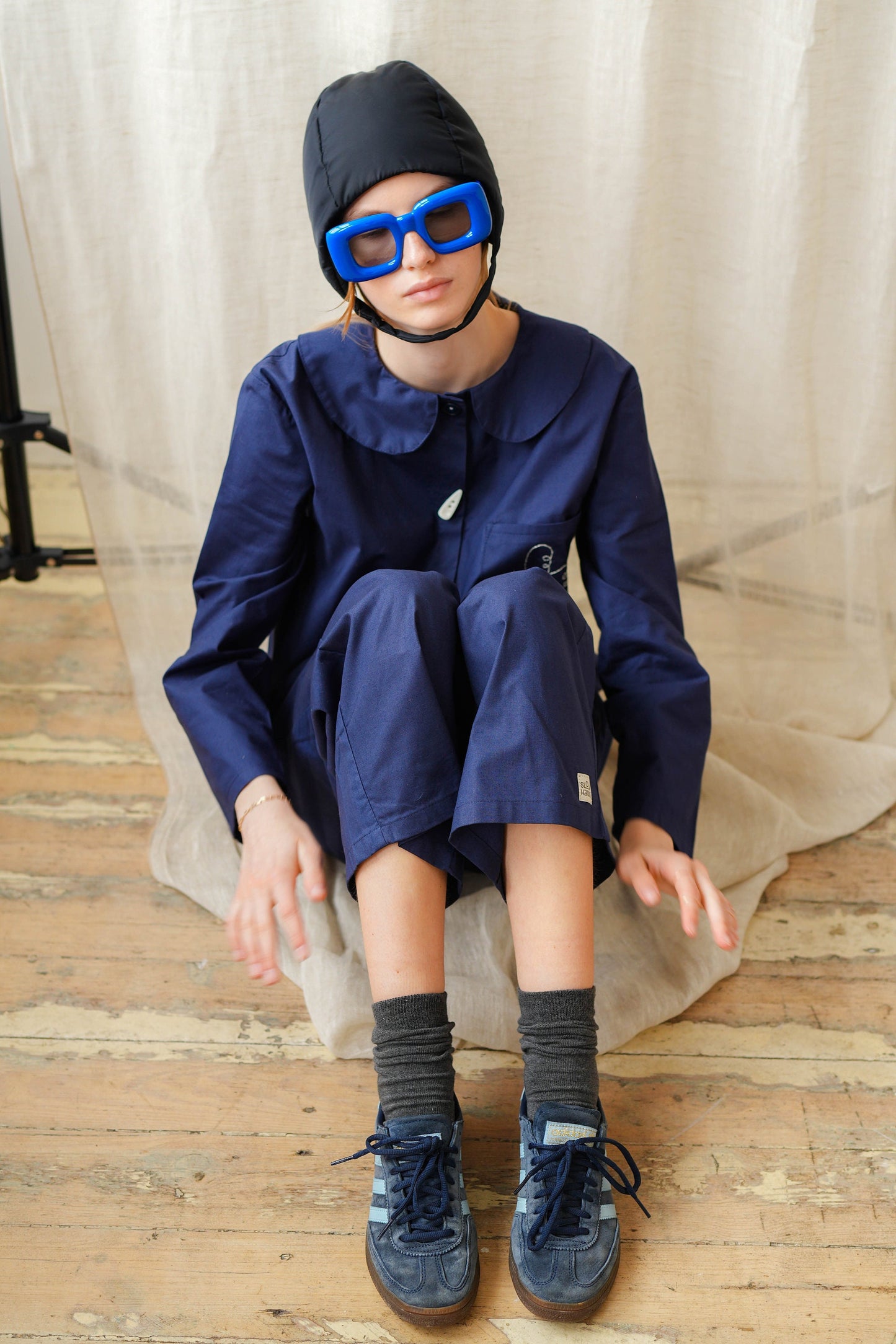 Pillow Puffer Quilted Aviator Helmet Cap Bonnet on a button in Black