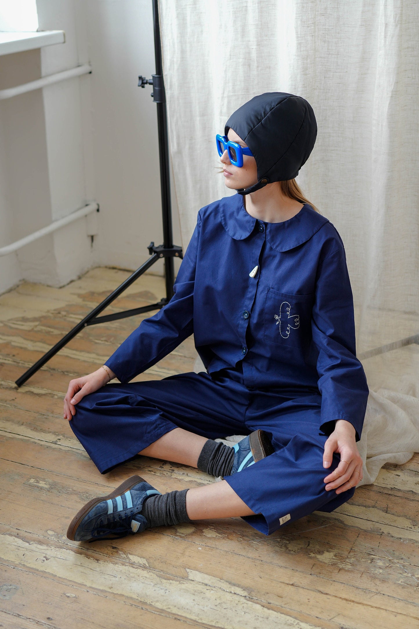 Pillow Puffer Quilted Aviator Helmet Cap Bonnet on a button in Black