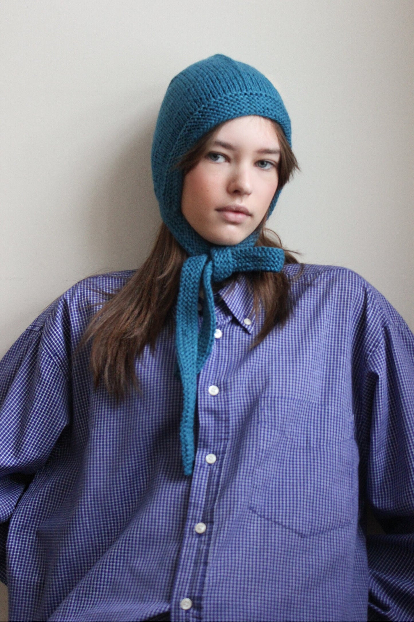 Hand-knitted Adult Bow Tie Bonnet hat in Ocean Blue
