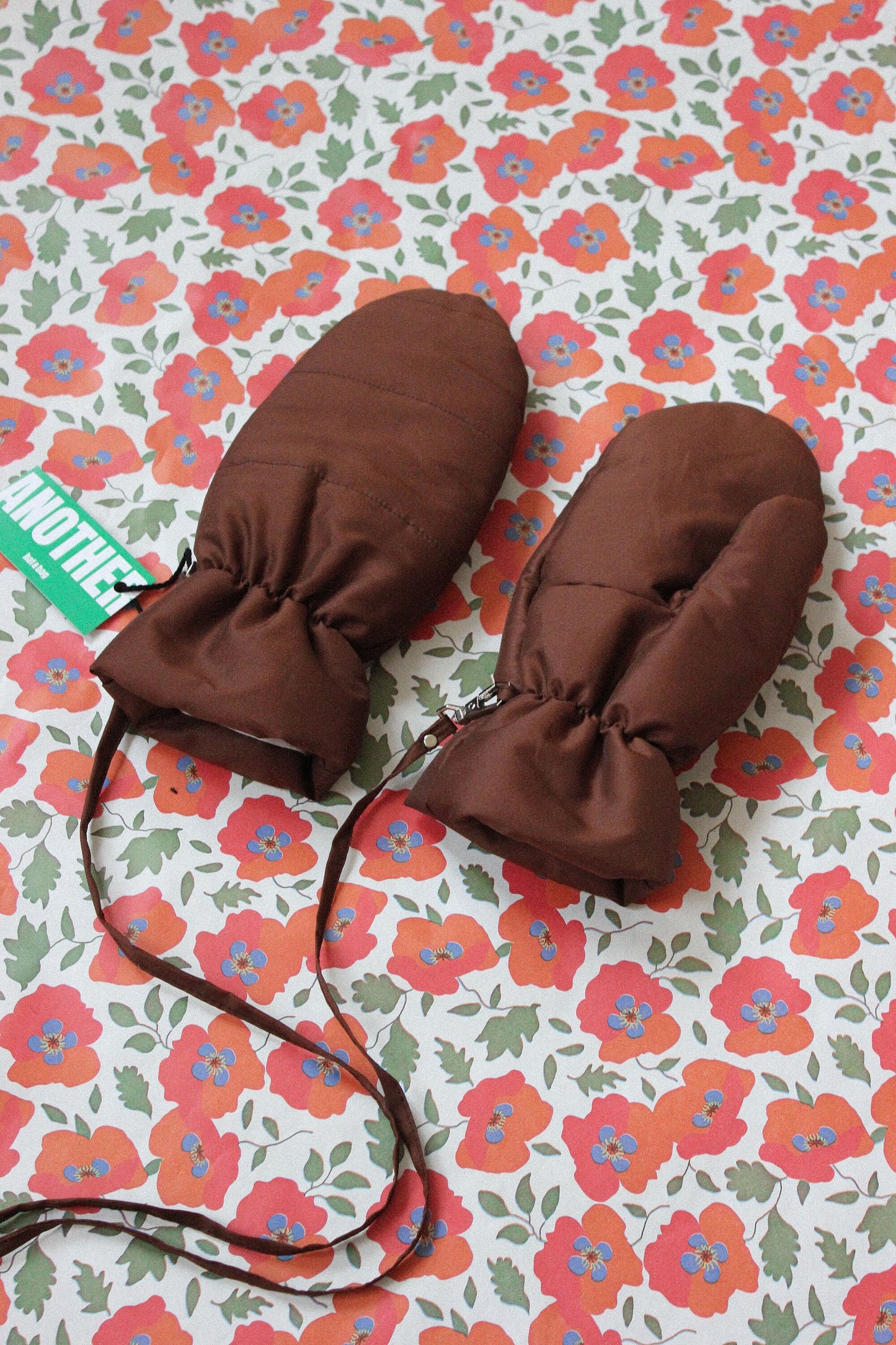 Puffer Mittens on Strings in Brown