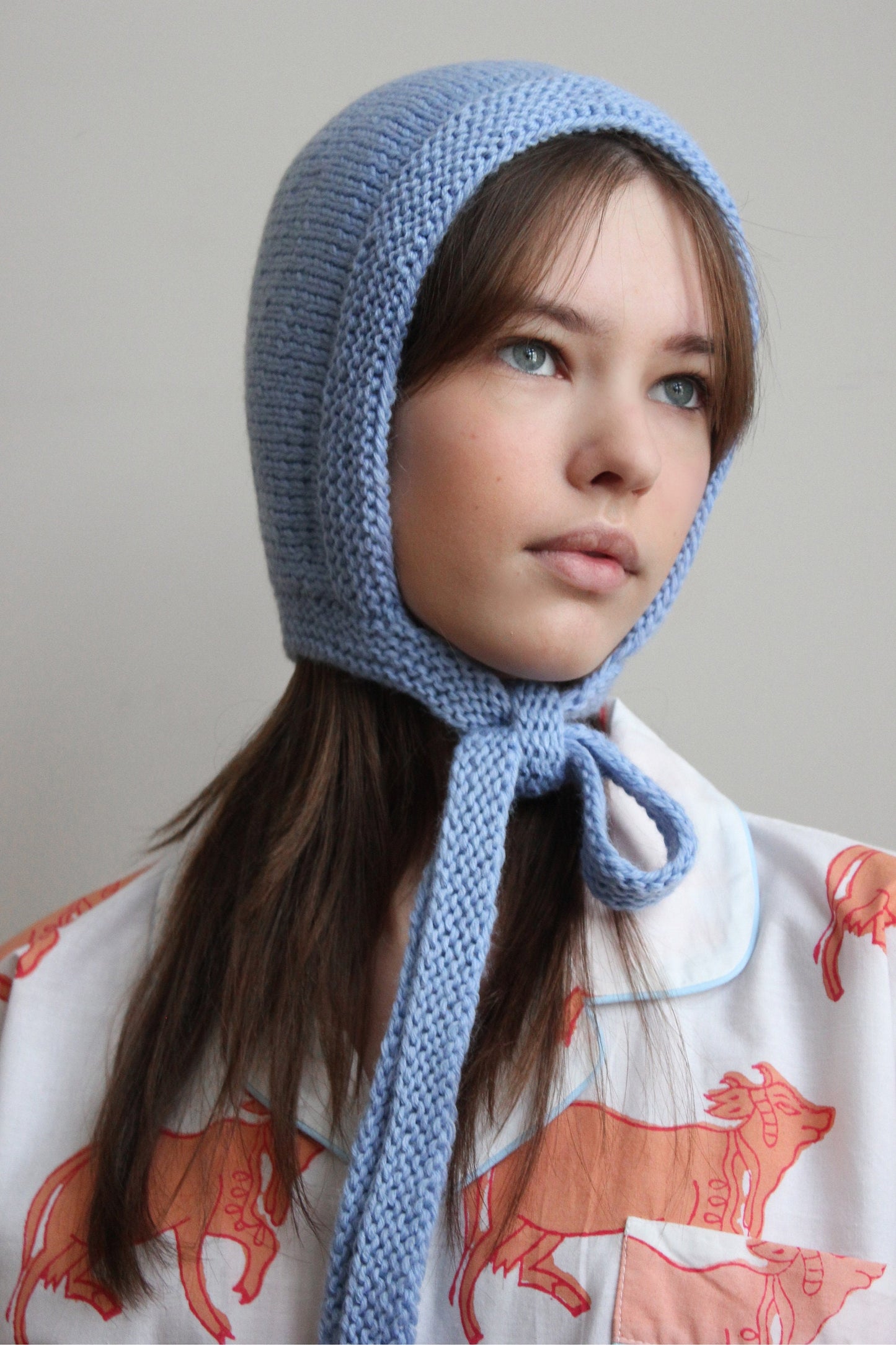Hand-knitted Adult Bow Tie Bonnet hat in Light Blue