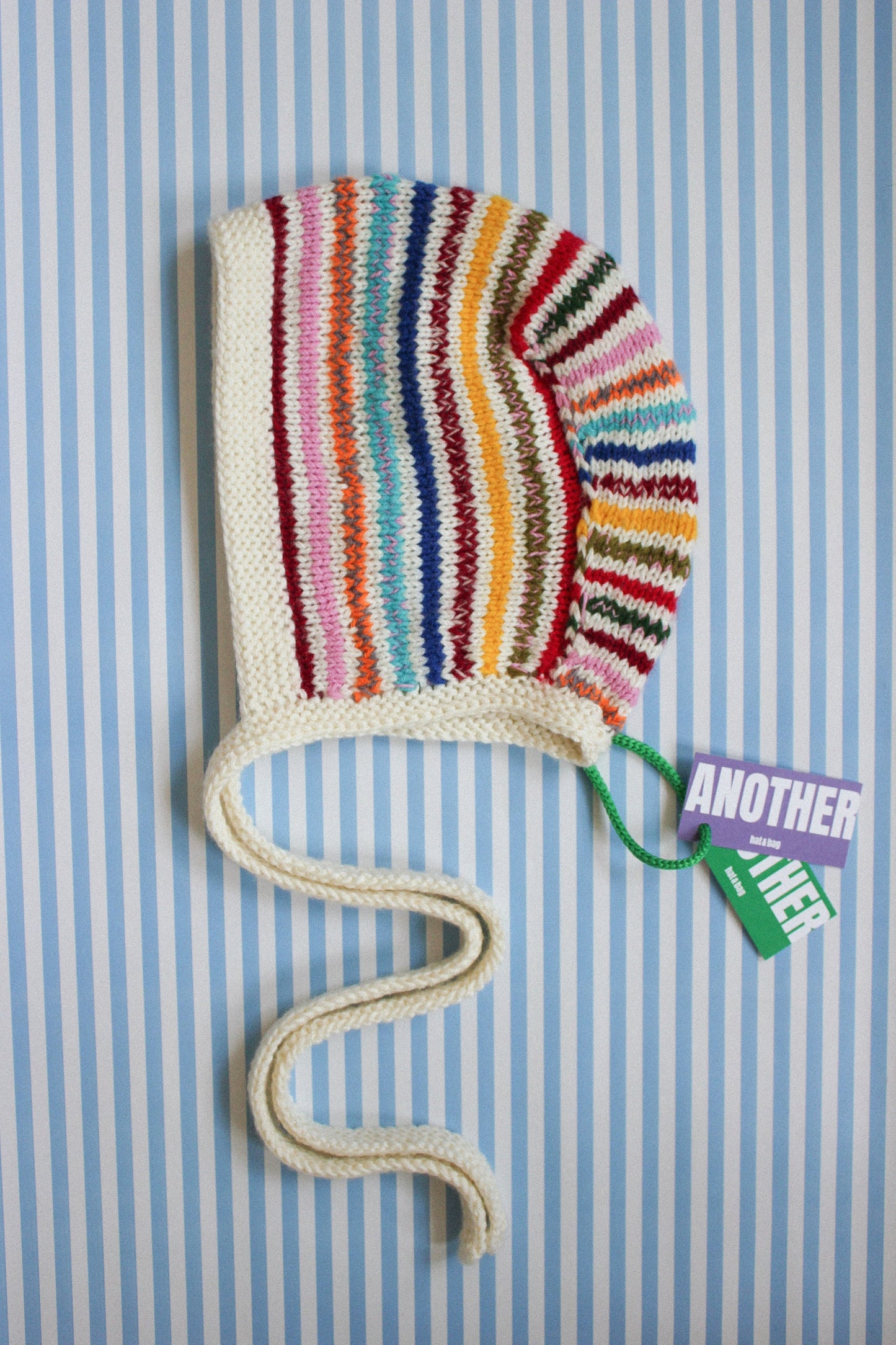 Random Multicolor Hand-knitted Adult Bow Tie Bonnet hat in Ivory