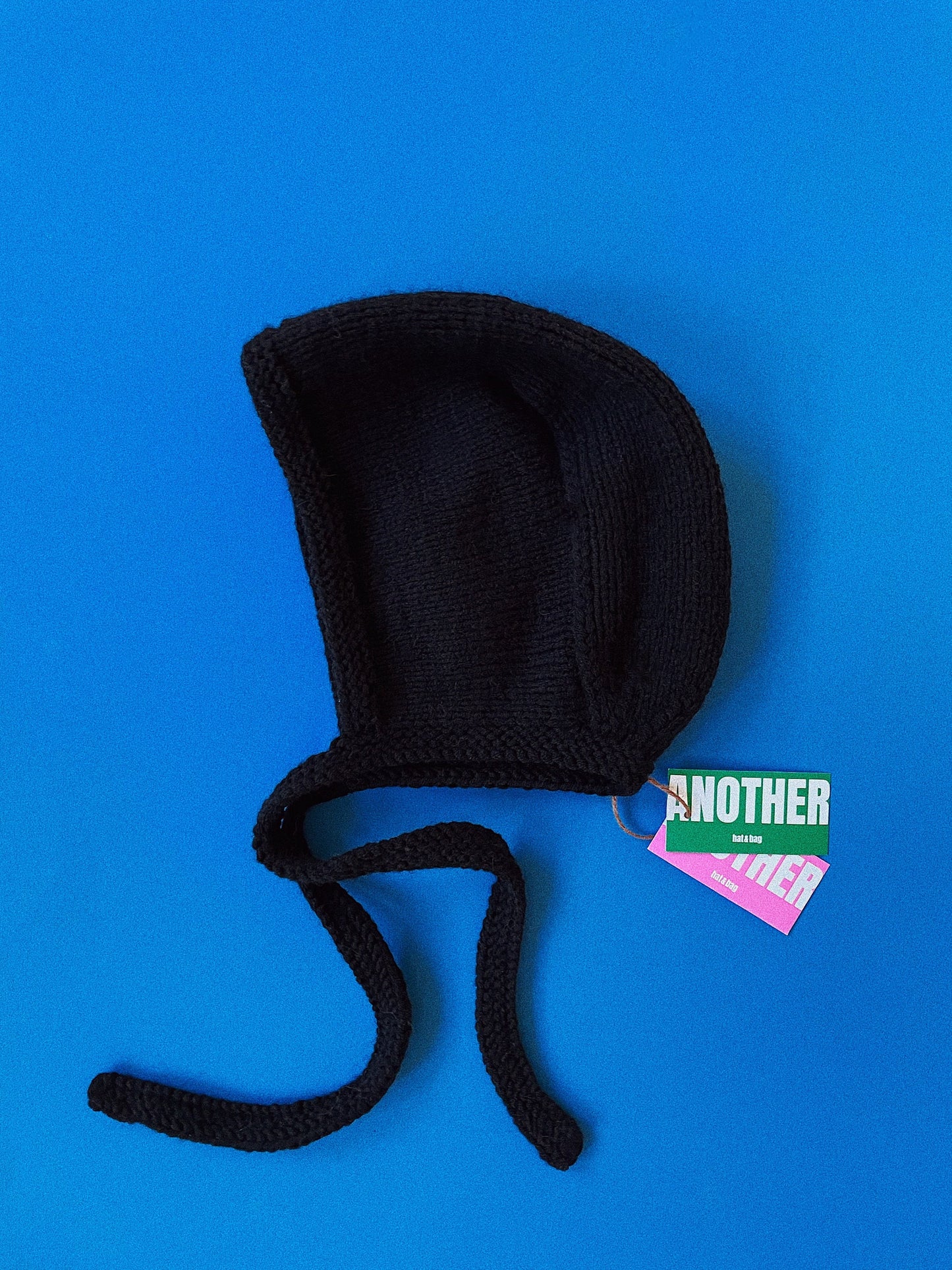 Hand-knitted Adult Bow Tie Bonnet hat in Black