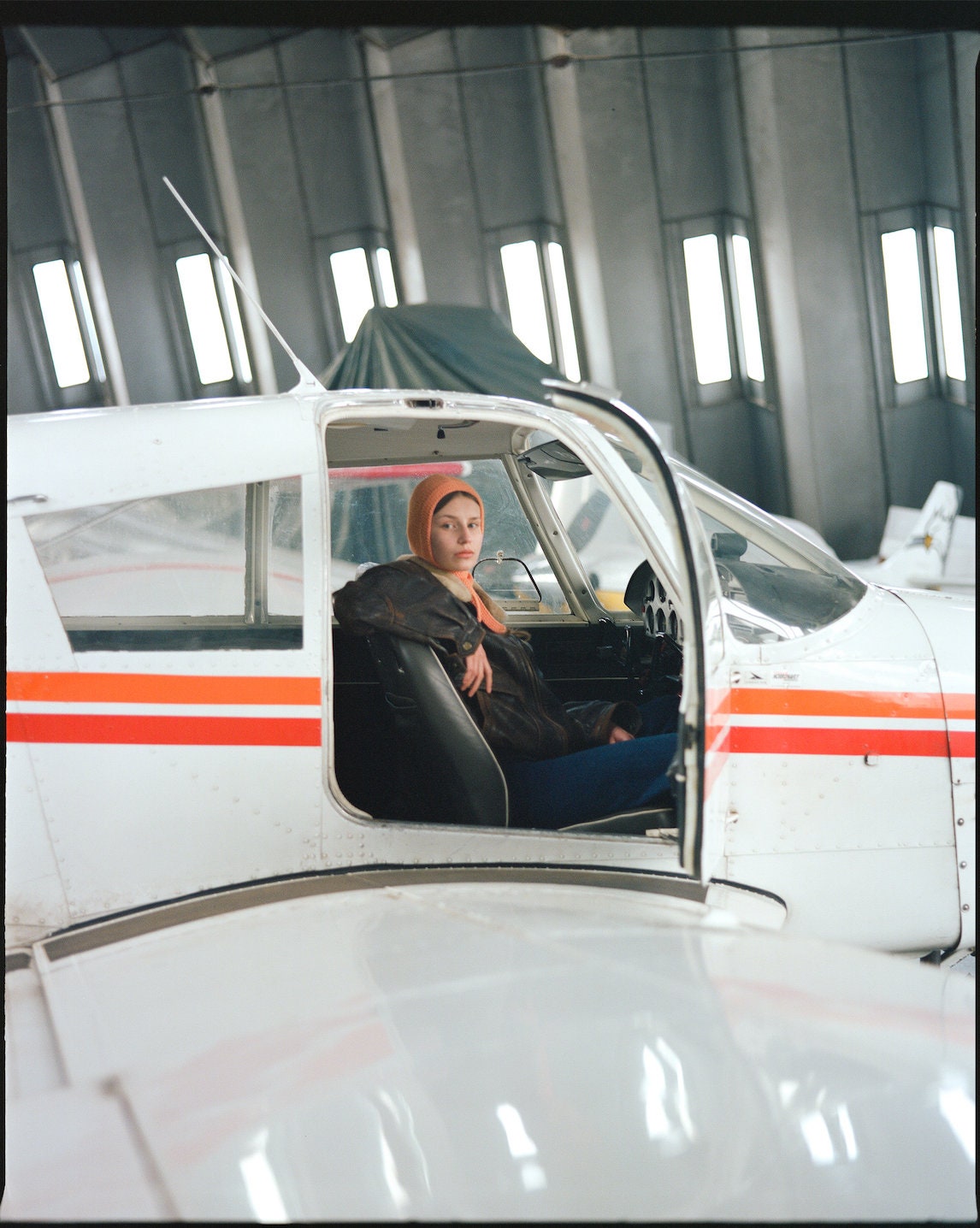Hand-knitted Adult Bow Tie Bonnet hat in Peach Fuzz