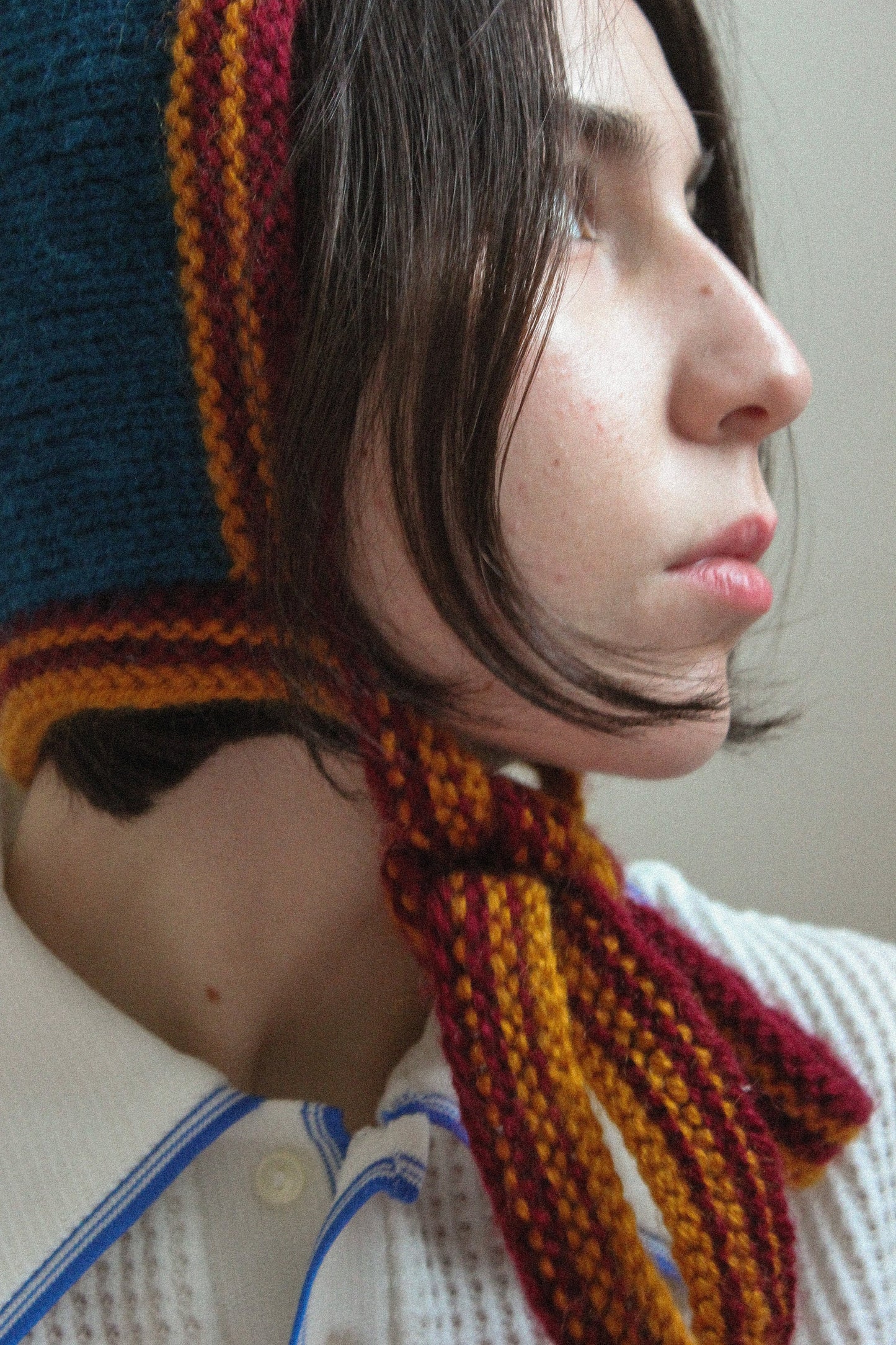 Hand-knitted Adult Bow Tie Bonnet hat in dull multicolor