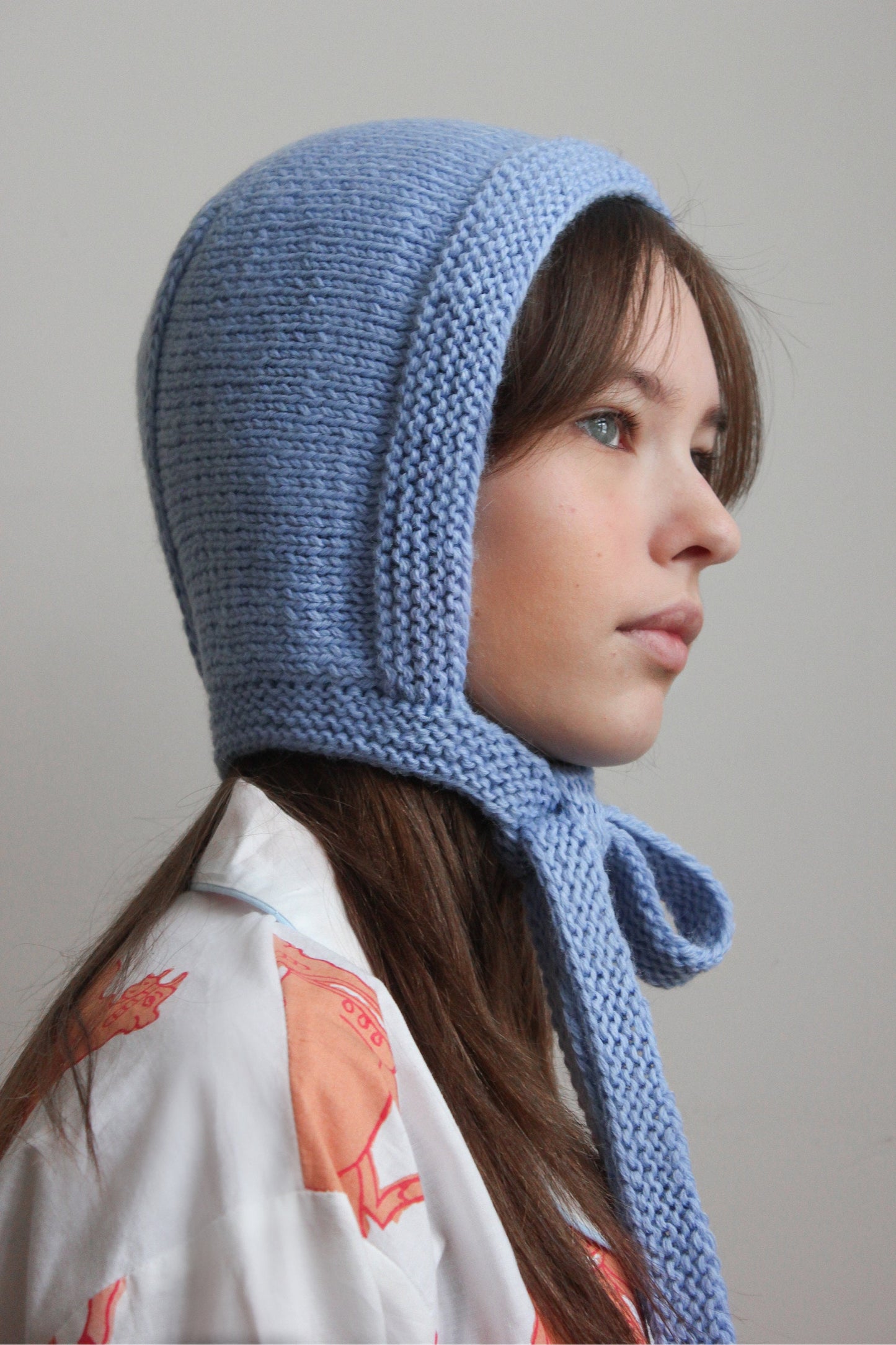 Hand-knitted Adult Bow Tie Bonnet hat in Light Blue