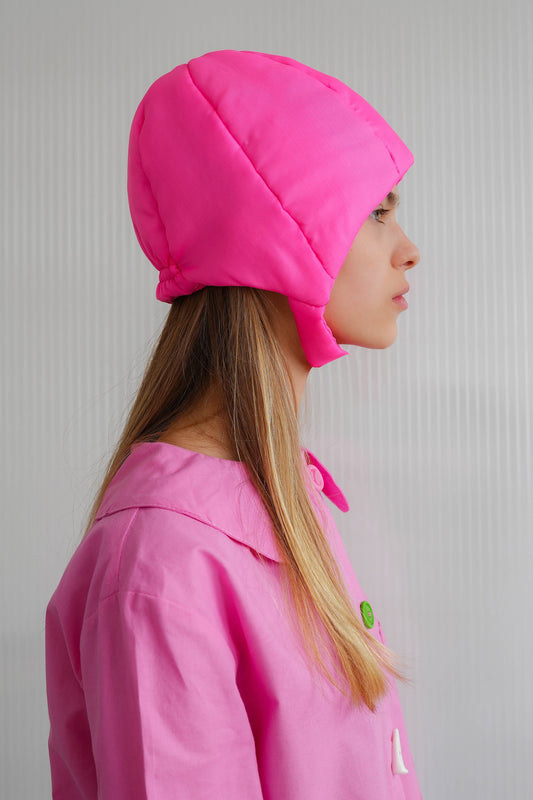 Pillow Puffer Quilted Aviator Helmet Cap Bonnet on a button in Hot Pink