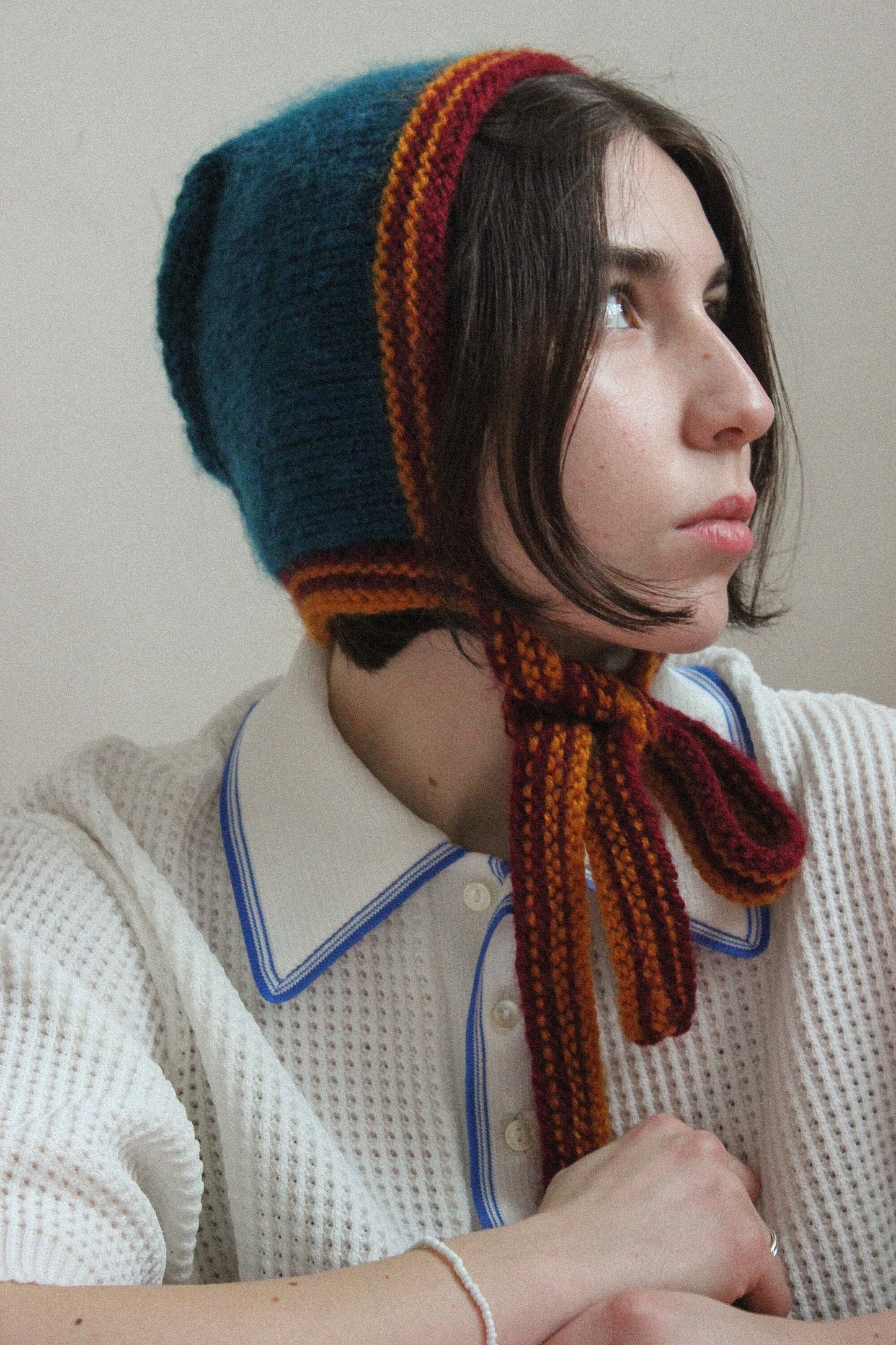 Hand-knitted Adult Bow Tie Bonnet hat in dull multicolor