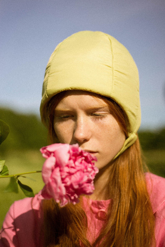 Pillow Puffer Quilted Aviator Helmet Cap Bonnet on a button in light Olive green