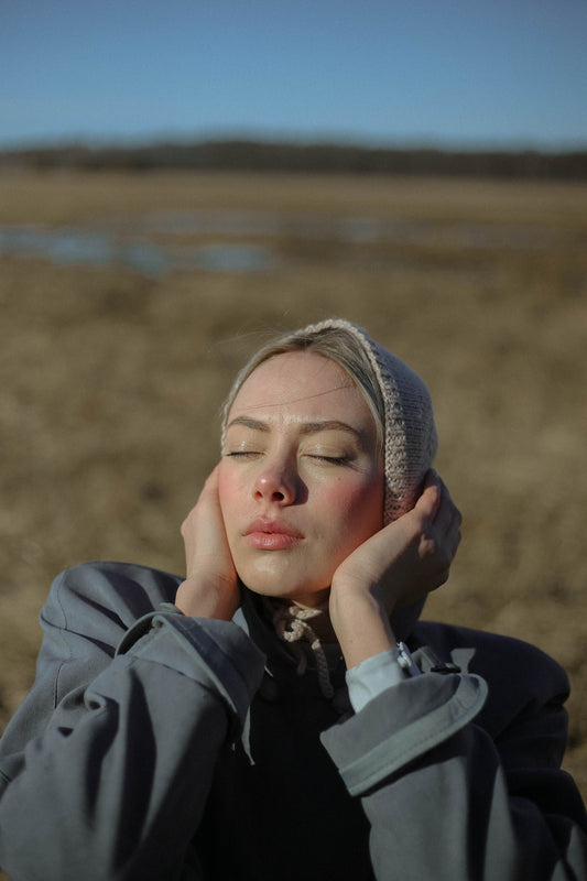 Handknitted Adult Bow Tie Bonnet in Beige
