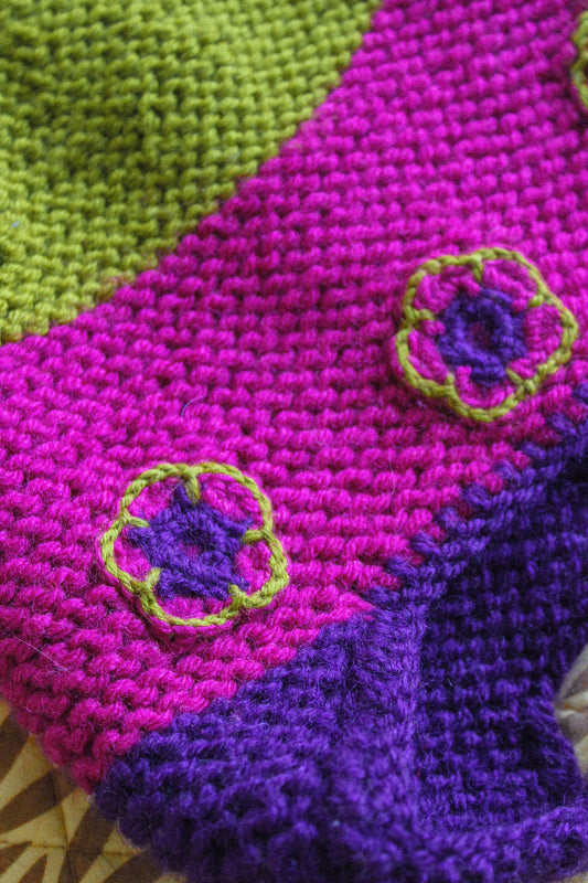 Multicolored Aviator Bonnet Hat with crochet flowers