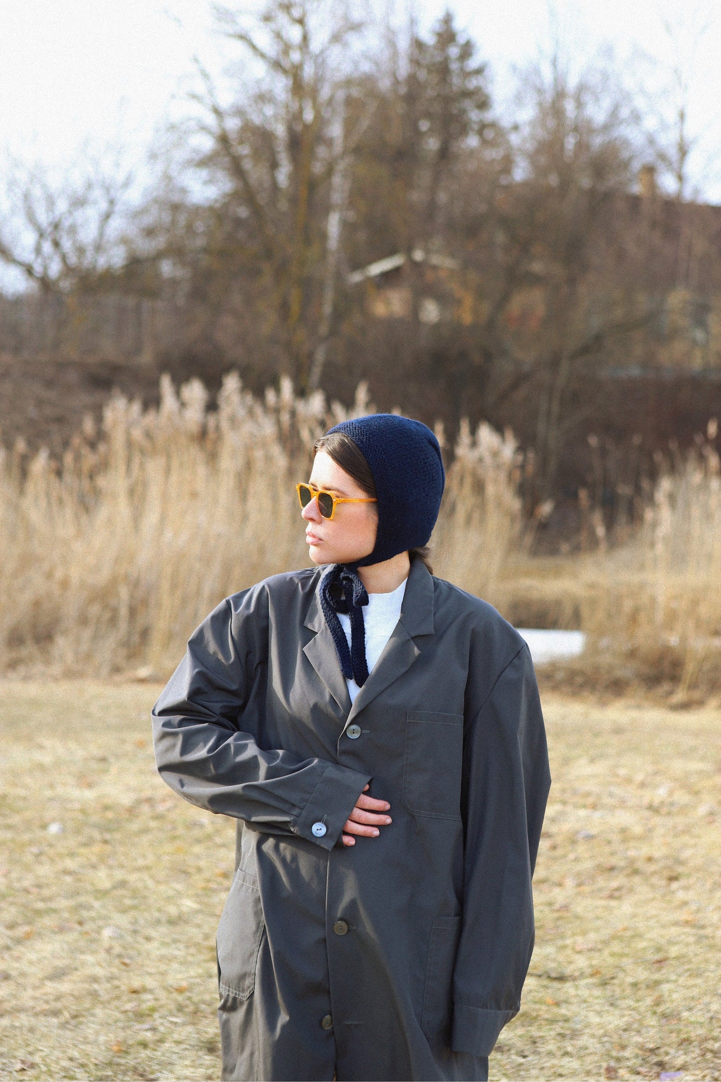 Hand-knitted Adult Bow Tie Bonnet hat in Navy