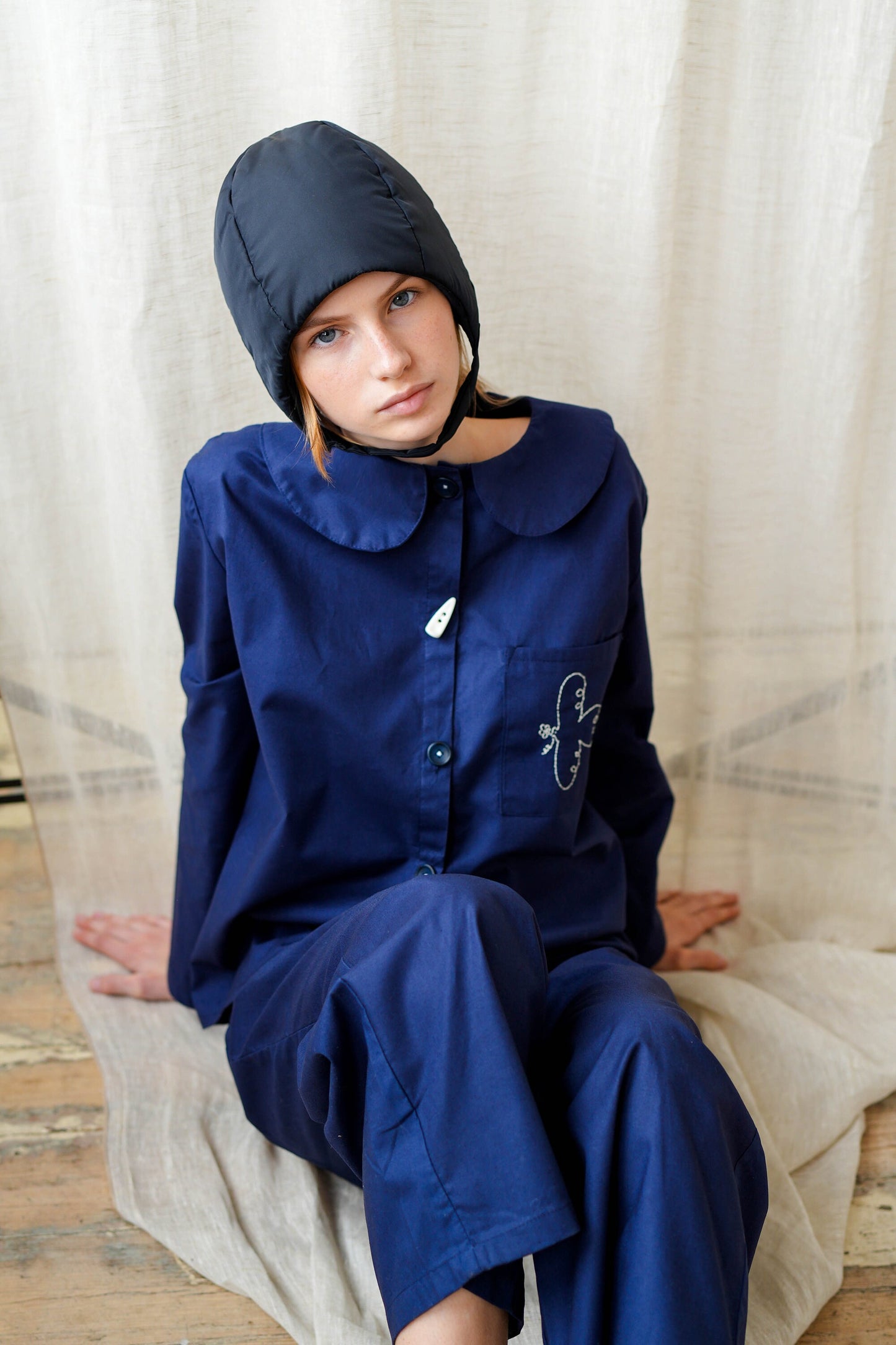 Pillow Puffer Quilted Aviator Helmet Cap Bonnet on a button in Black