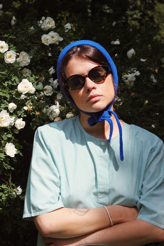 Hand-knitted Adult Bow Tie Bonnet hat in blue