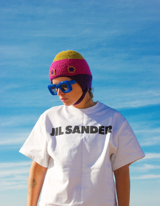 Multicolored Aviator Bonnet Hat with crochet flowers