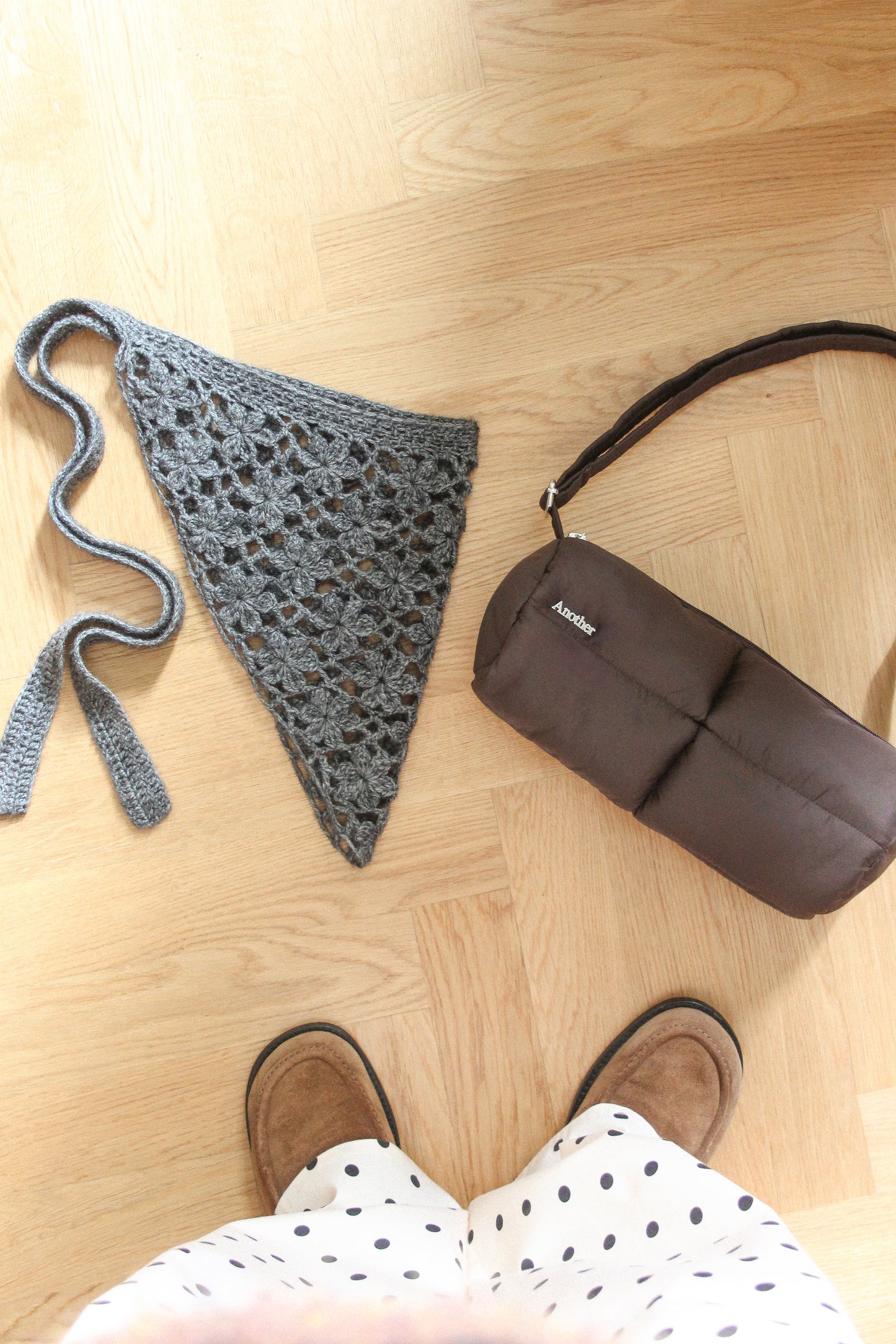 Pillow Puffer Cylinder bag in brown