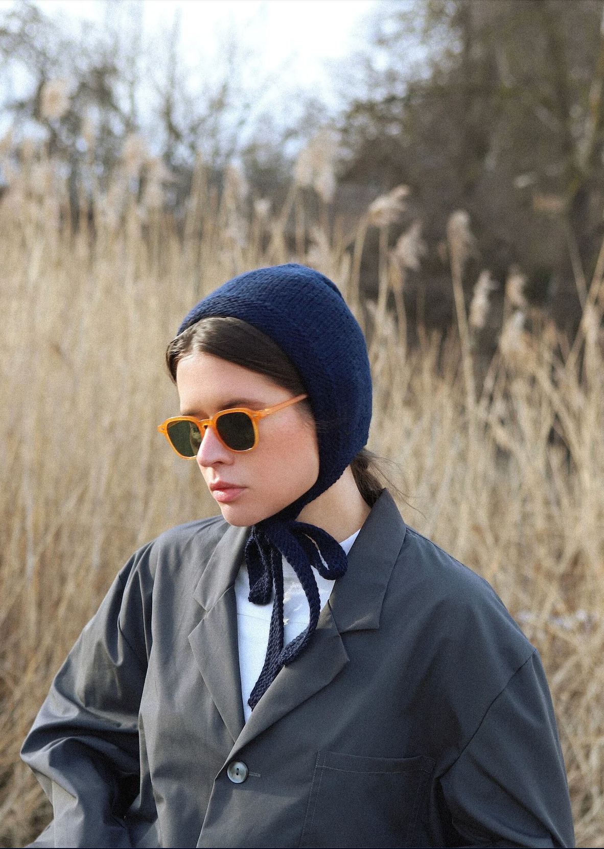 Hand-knitted Adult Bow Tie Bonnet hat in Navy