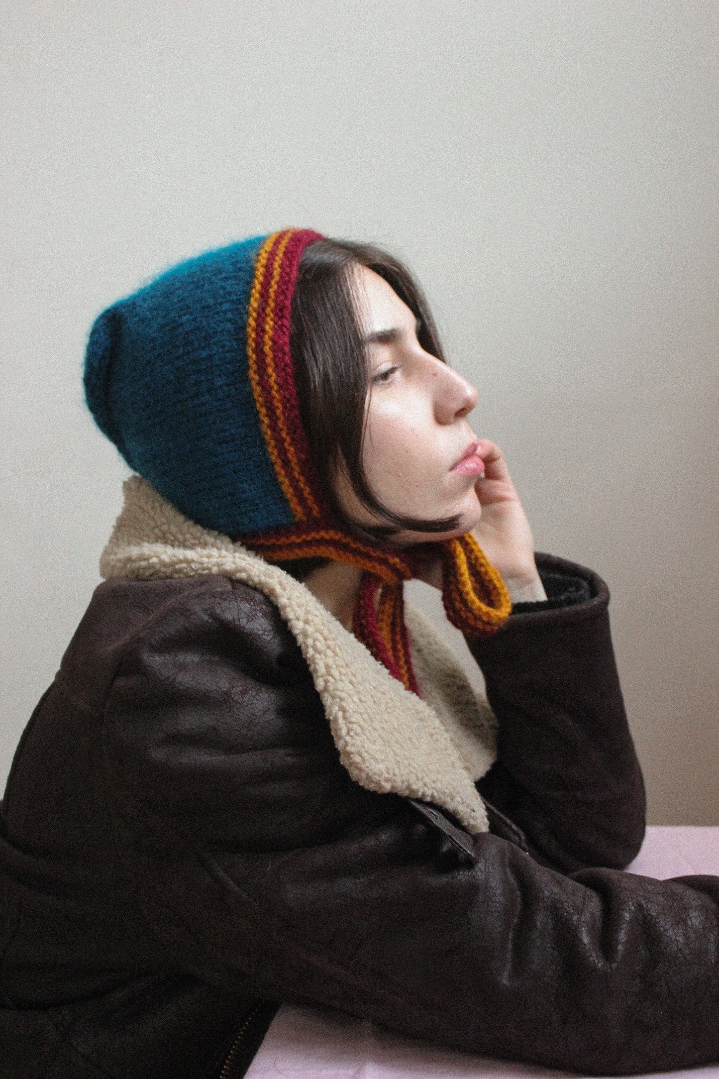 Hand-knitted Adult Bow Tie Bonnet hat in dull multicolor