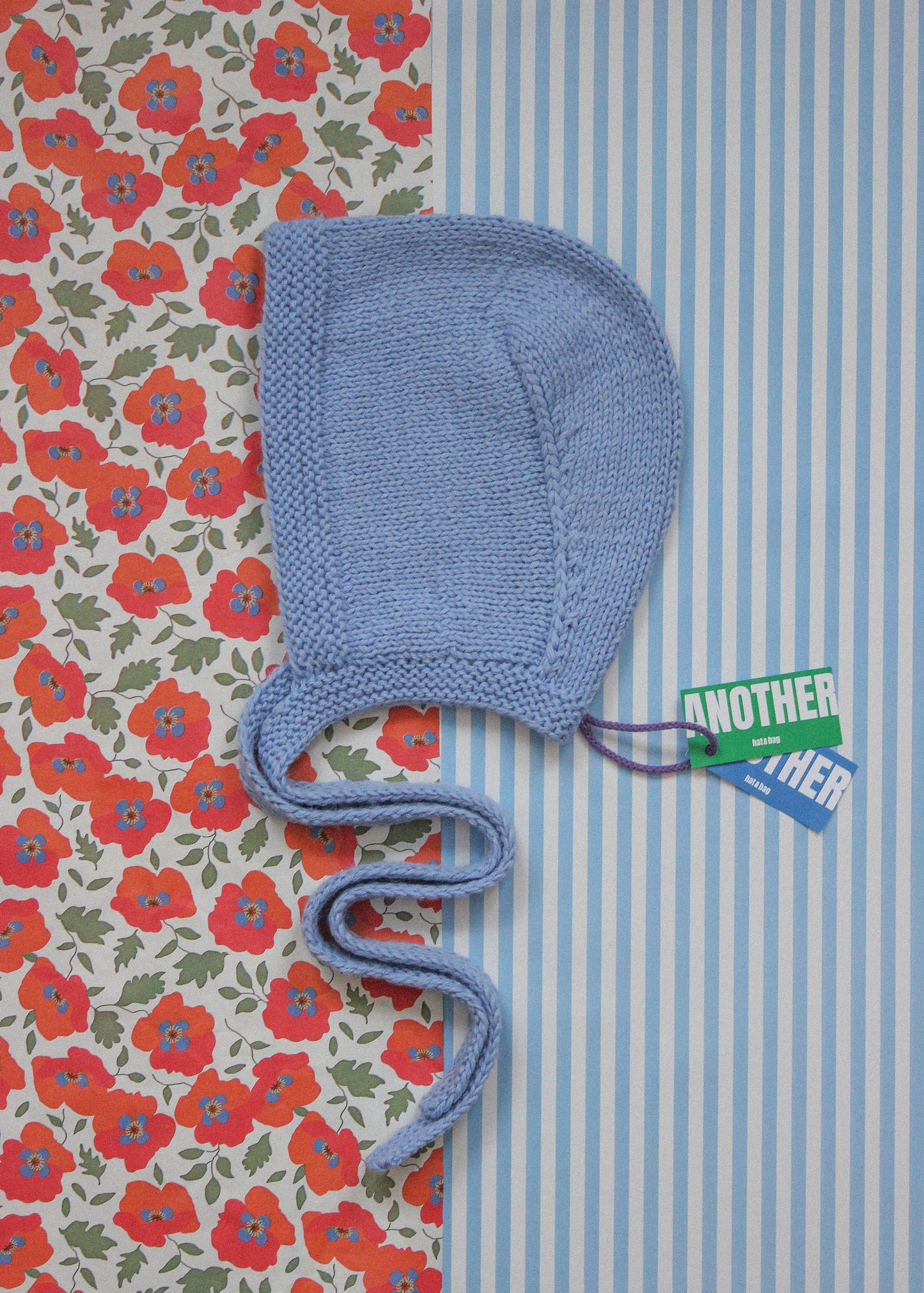 Hand-knitted Adult Bow Tie Bonnet hat in Light Blue