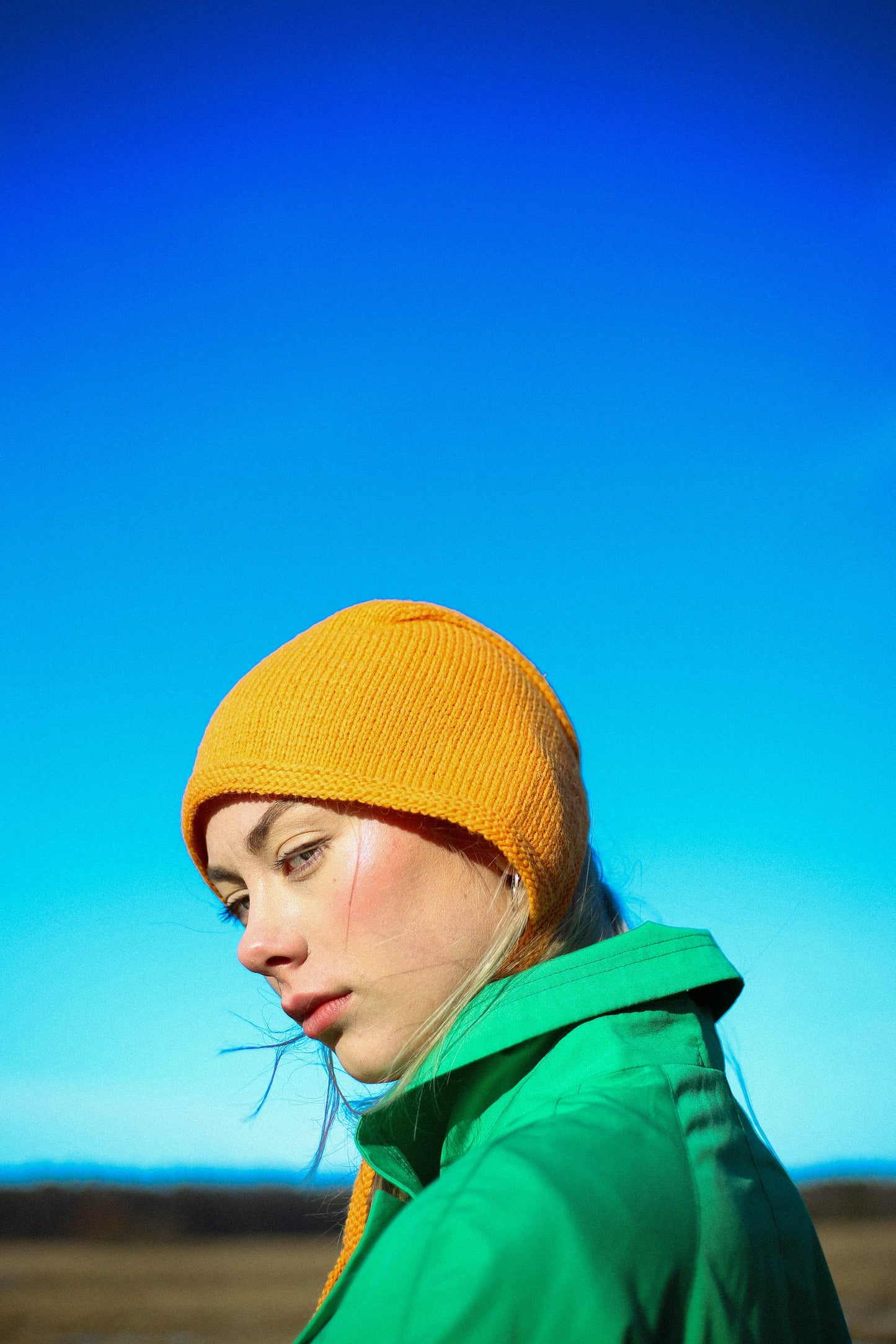 Hand-knitted Adult Bow Tie Bonnet hat in mandarin orange