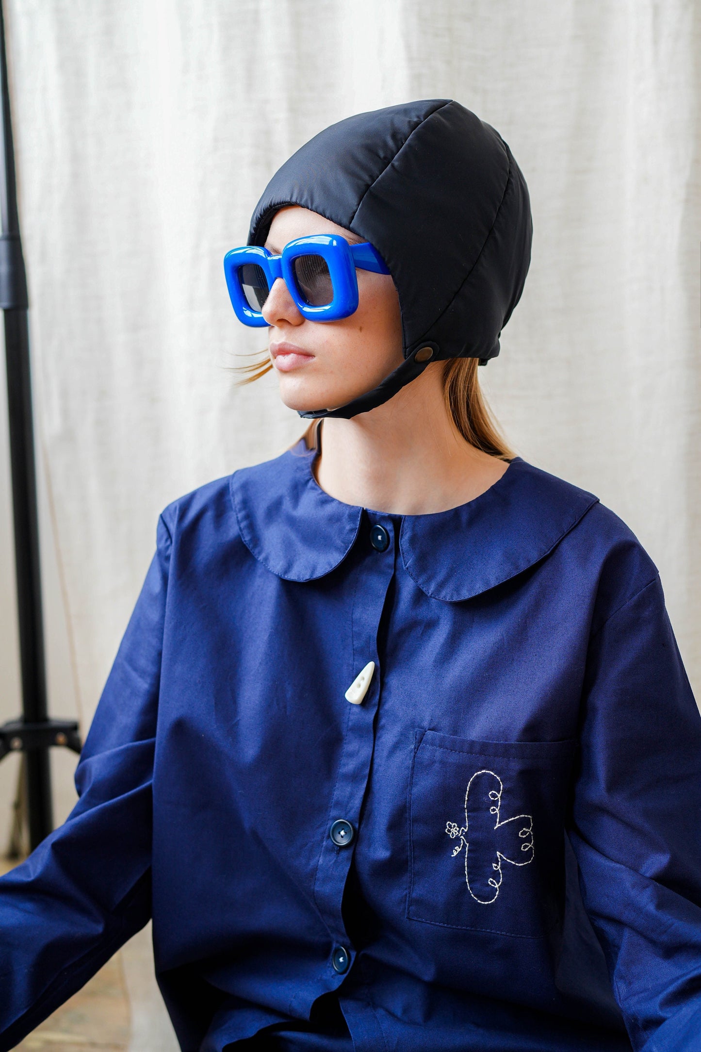 Pillow Puffer Quilted Aviator Helmet Cap Bonnet on a button in Black