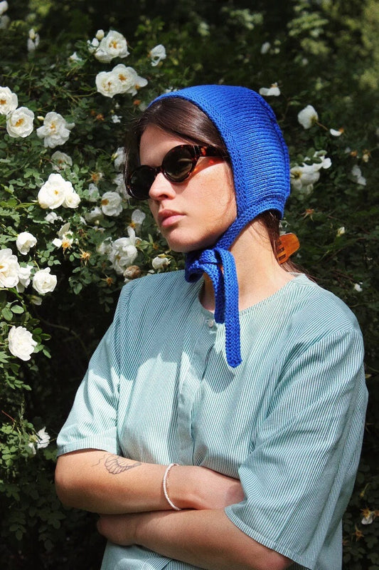 Hand-knitted Adult Bow Tie Bonnet hat in Blue