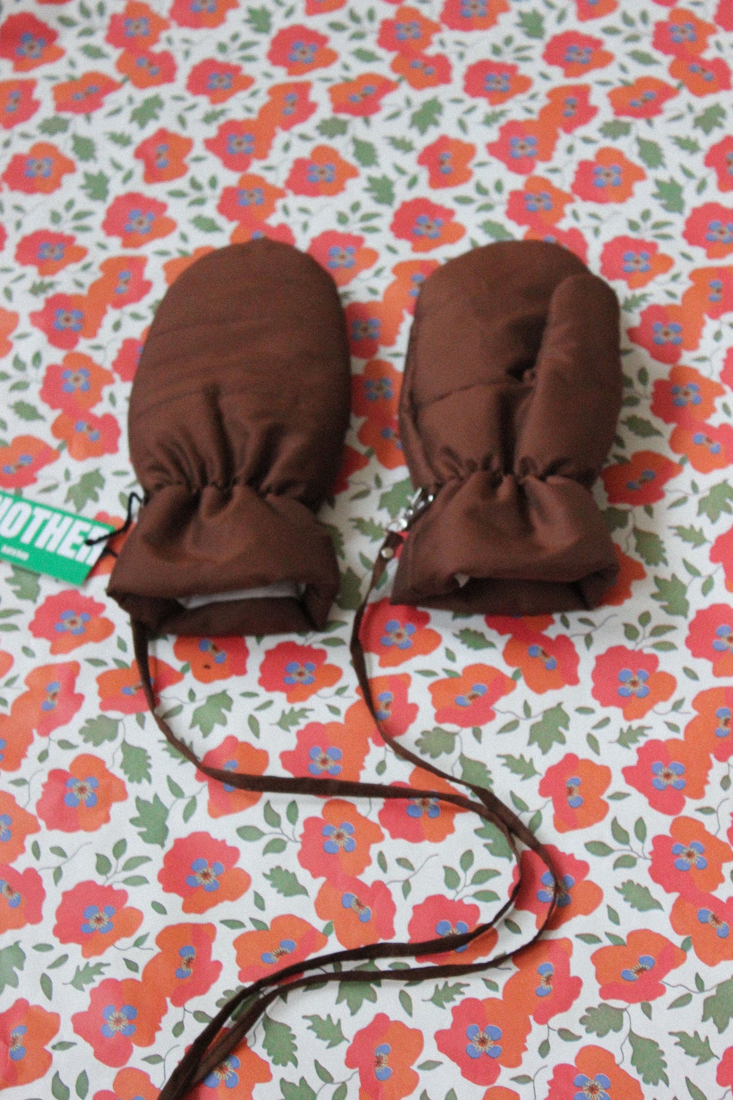 Puffer Mittens on Strings in Brown