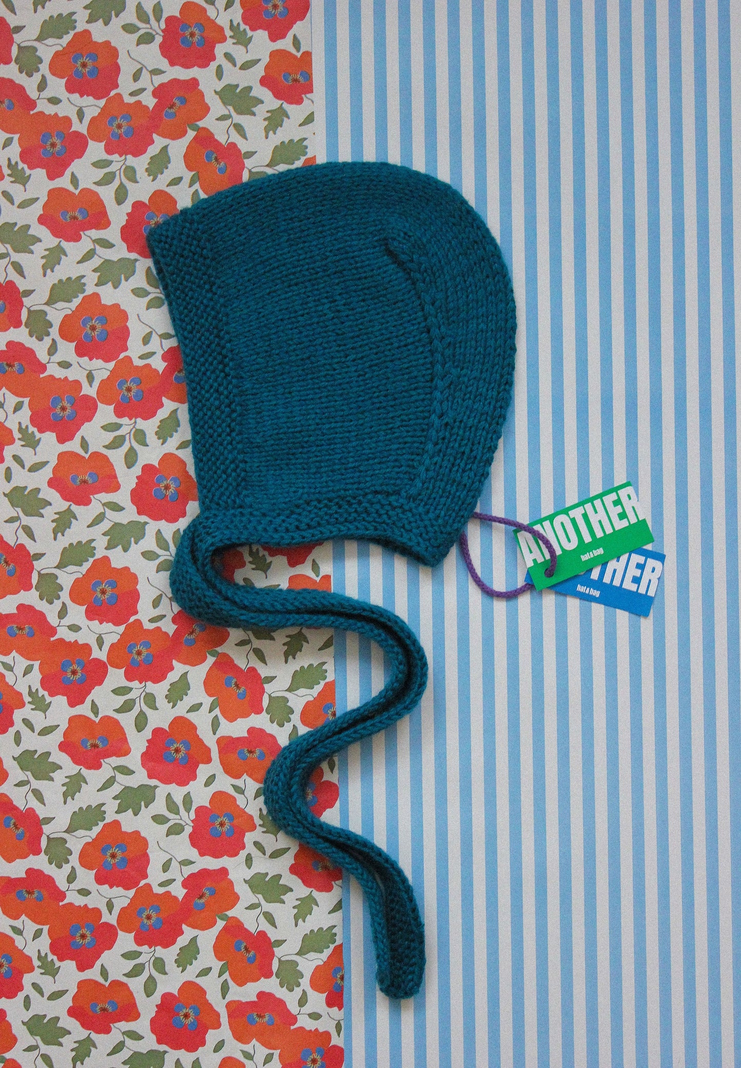 Hand-knitted Adult Bow Tie Bonnet hat in Ocean Blue