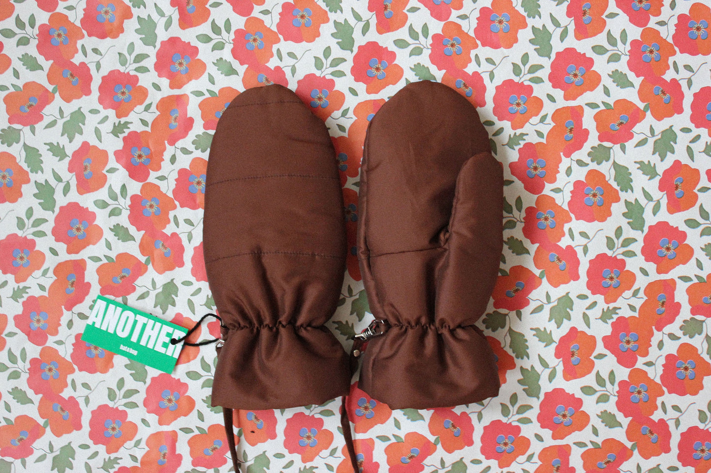 Puffer Mittens on Strings in Brown