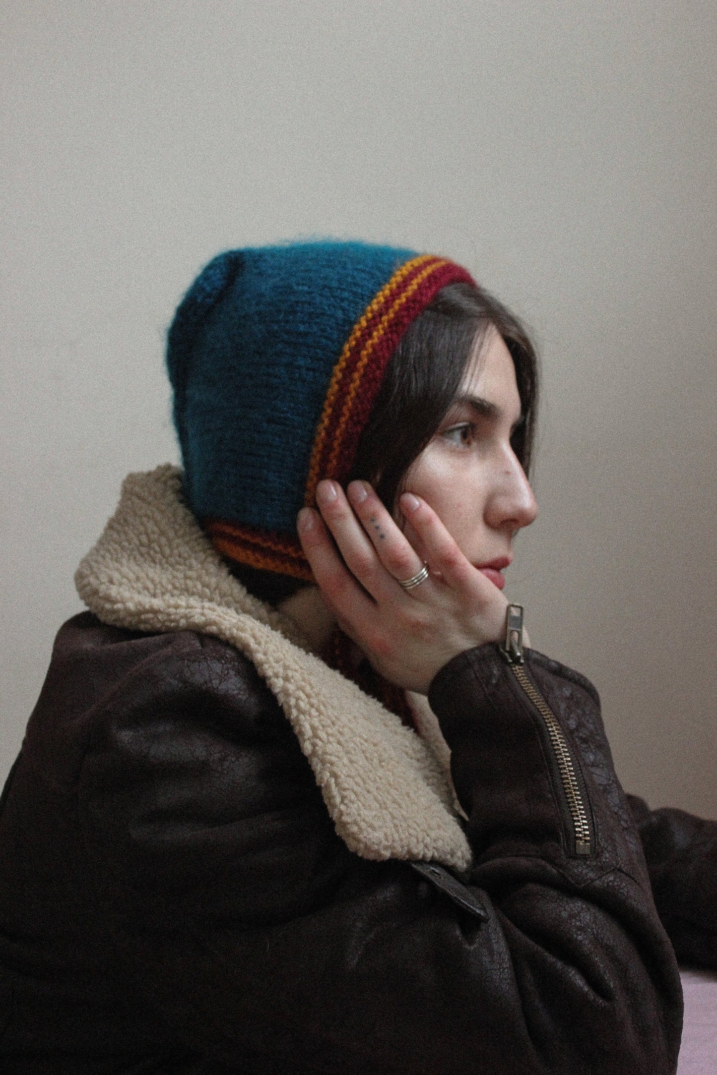 Hand-knitted Adult Bow Tie Bonnet hat in dull multicolor