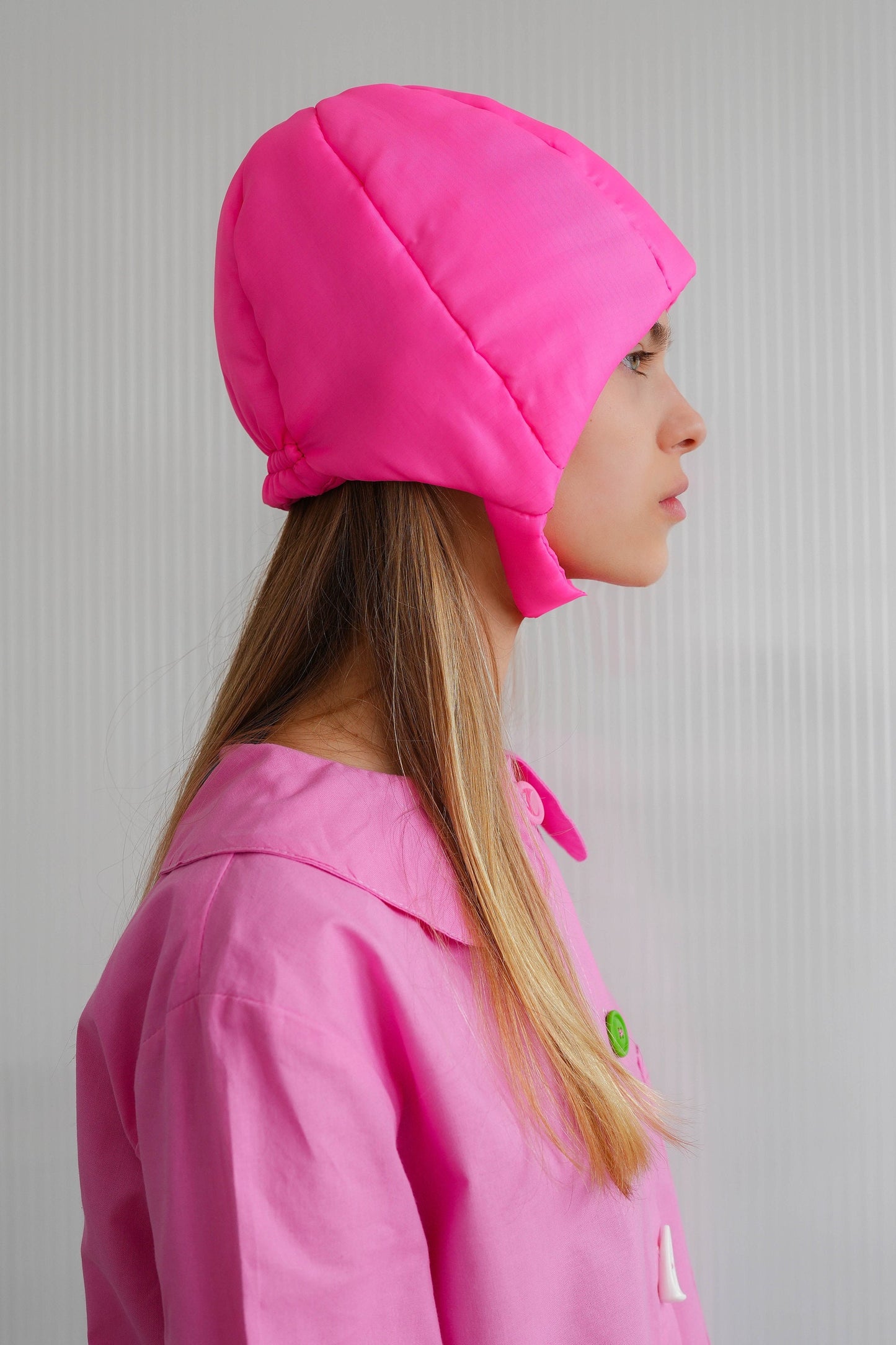 Pillow Puffer Quilted Aviator Helmet Cap Bonnet on a button in Hot Pink