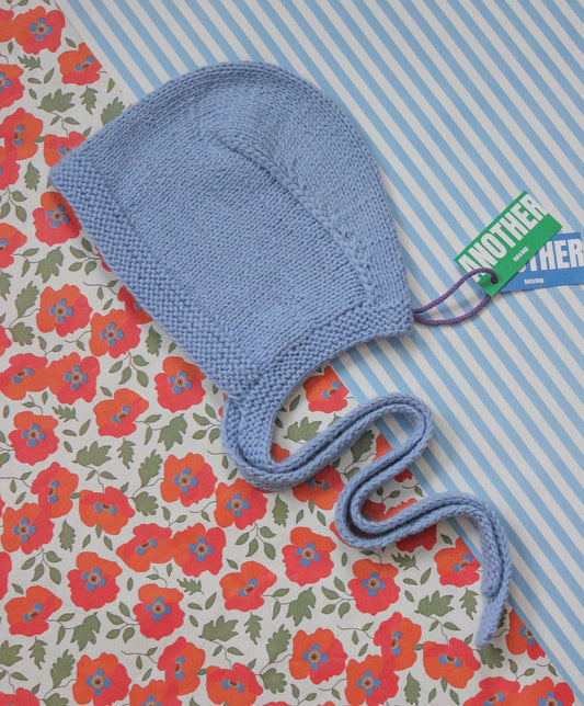 Hand-knitted Adult Bow Tie Bonnet hat in Light Blue