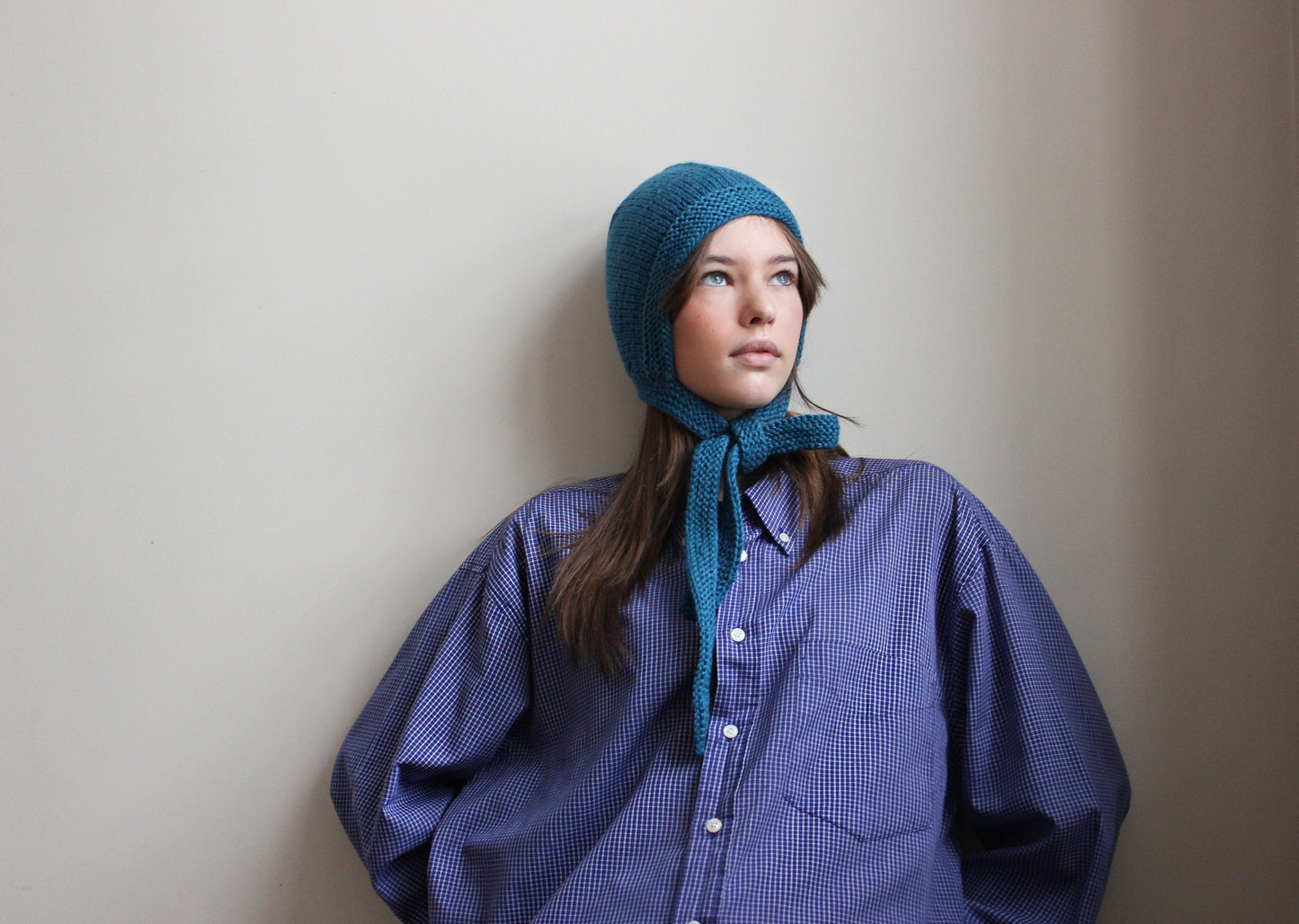 Hand-knitted Adult Bow Tie Bonnet hat in Ocean Blue