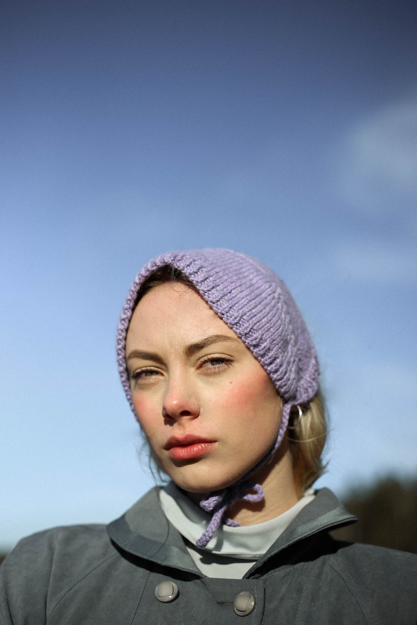 Hand - knitted Adult Bow Tie Bonnet in powder Lilac