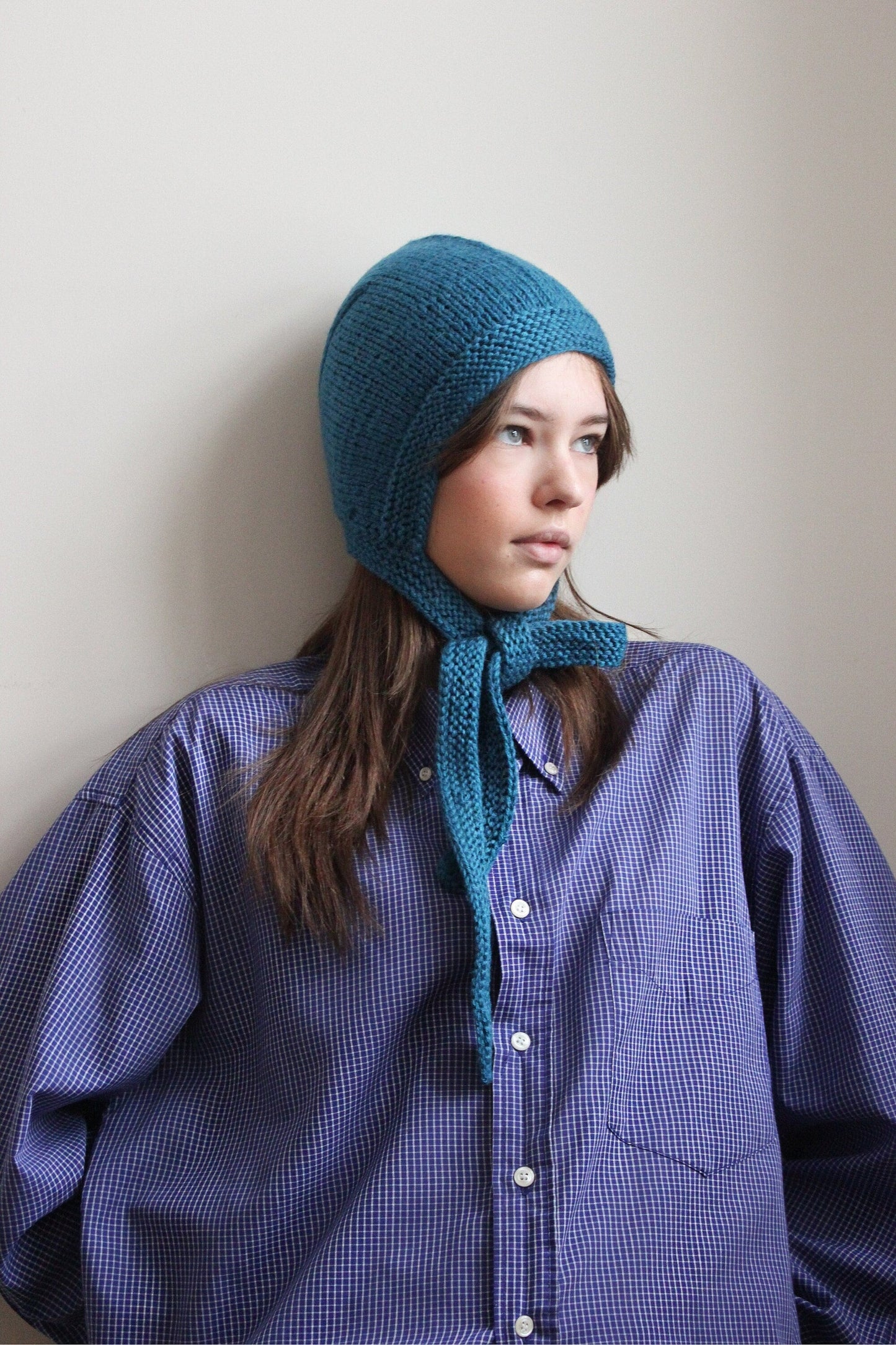 Hand-knitted Adult Bow Tie Bonnet hat in Ocean Blue