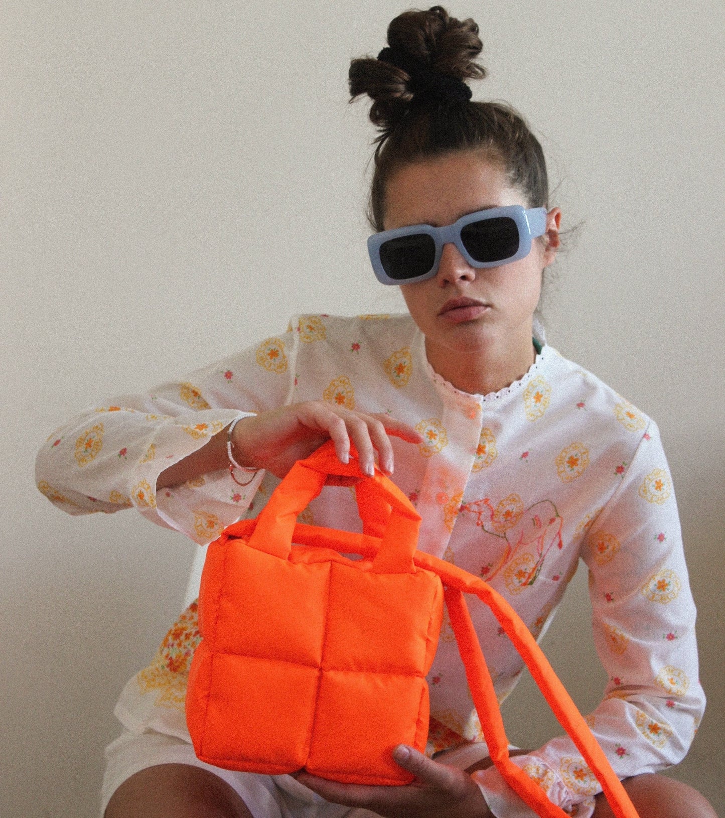 Mini Pillow Puffer Essential bag in Neon Mandarin
