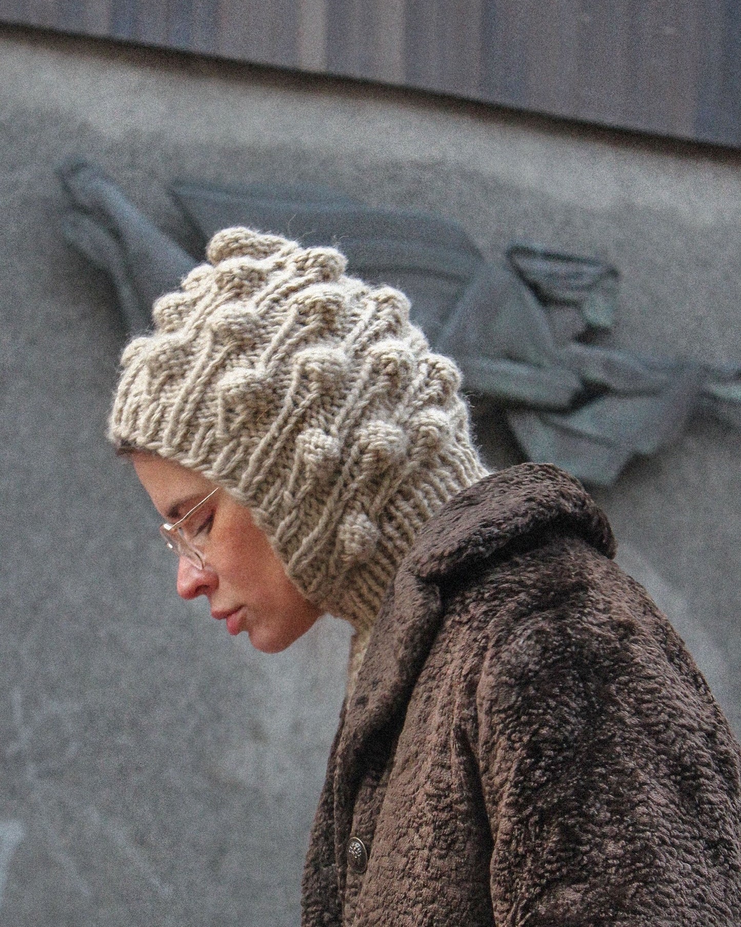 Balaclava with dimensional tuck knitting technique in Beige