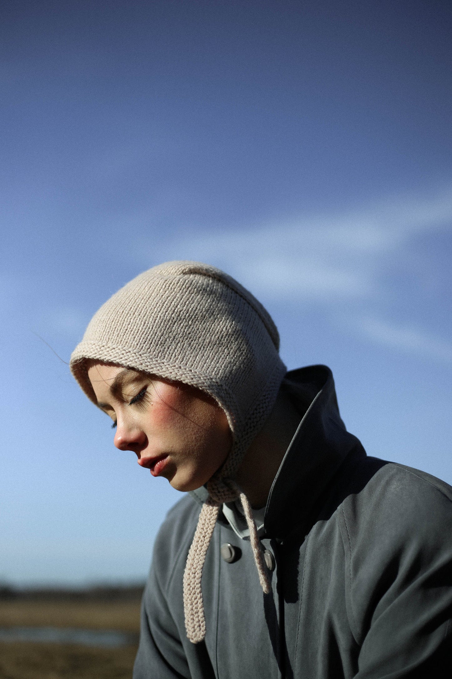 Hand-knitted Adult Bow Tie Bonnet hat in cream beige