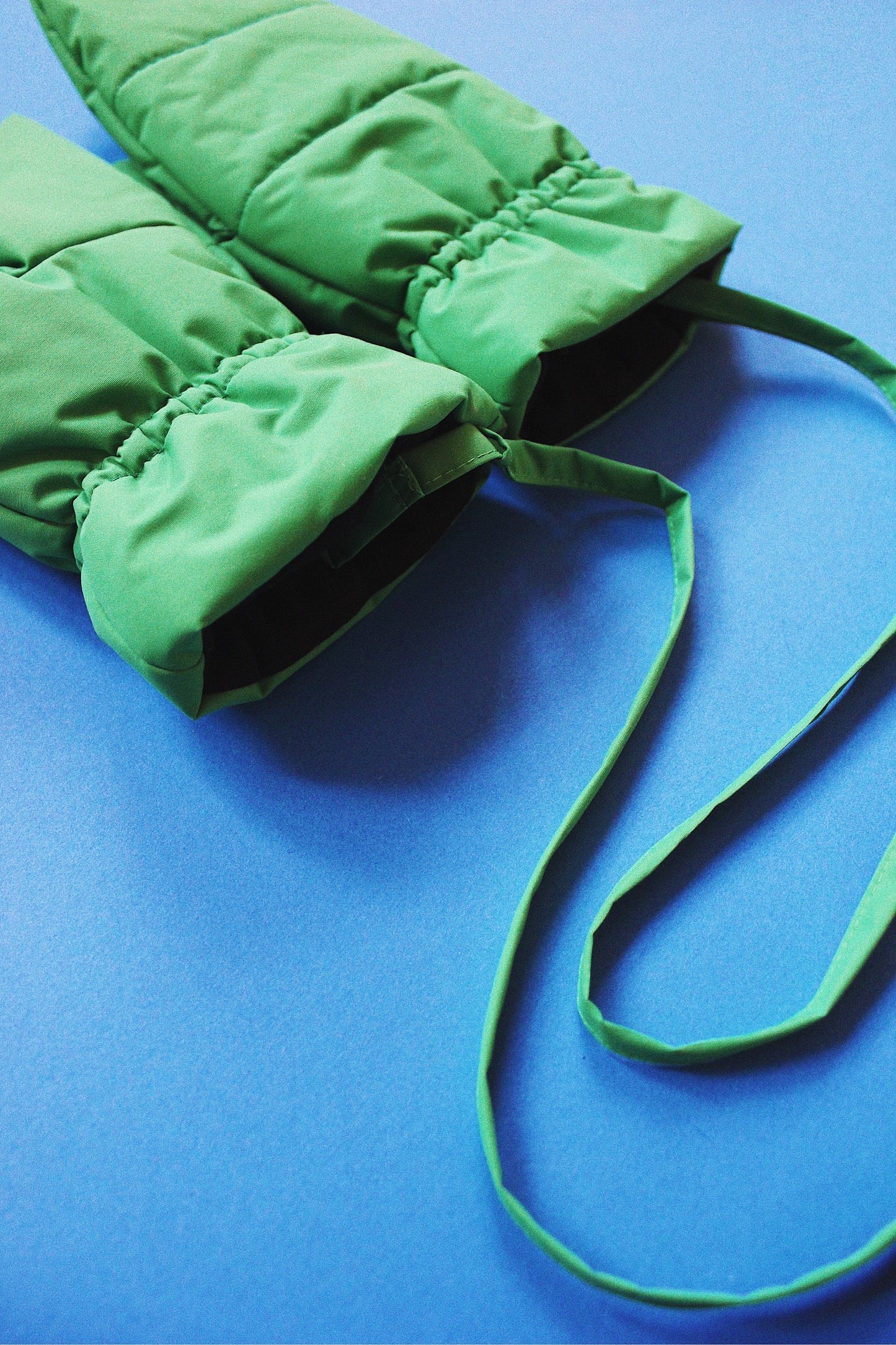 Pillow Puffer mittens on Strings in Green