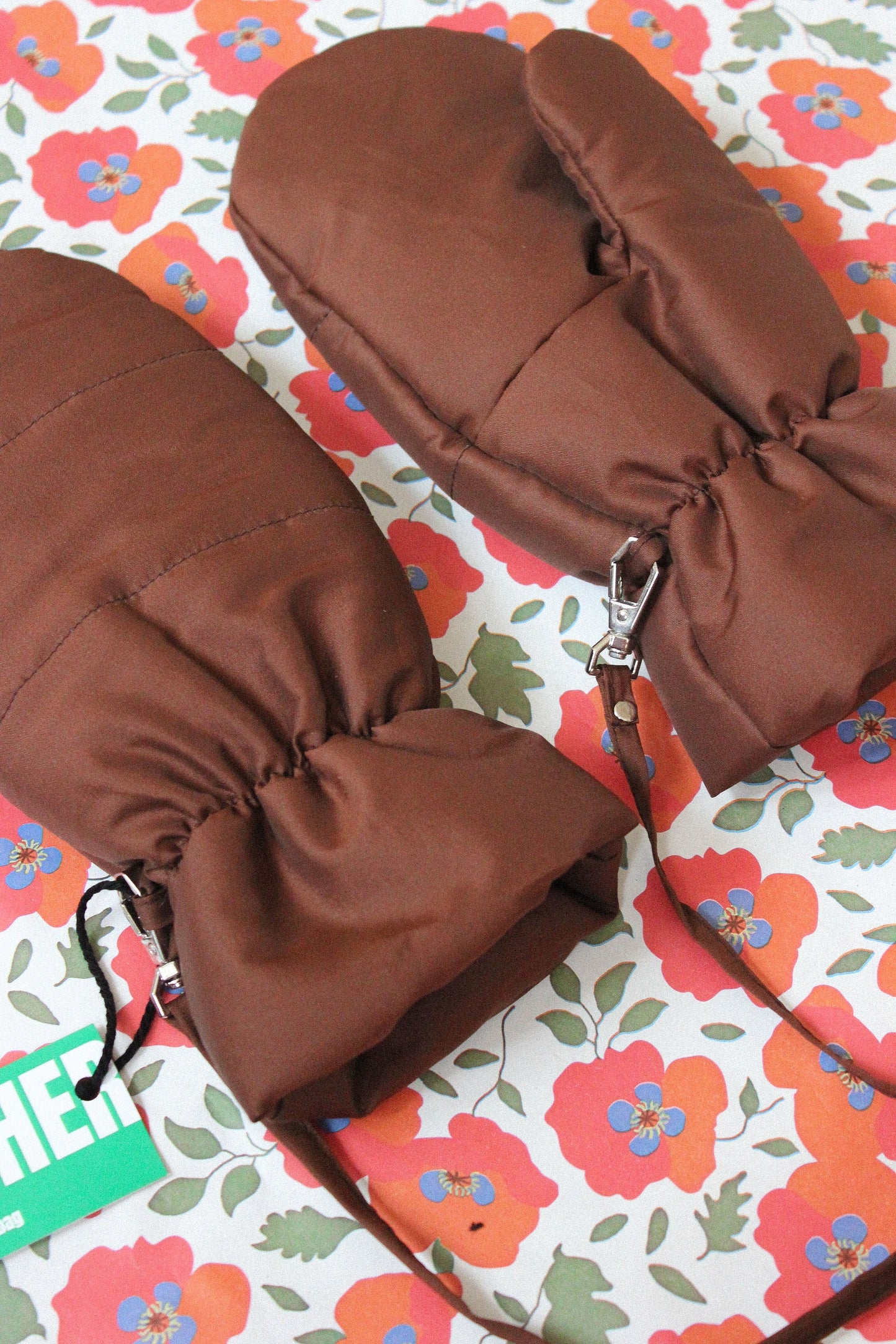 Puffer Mittens on Strings in Brown