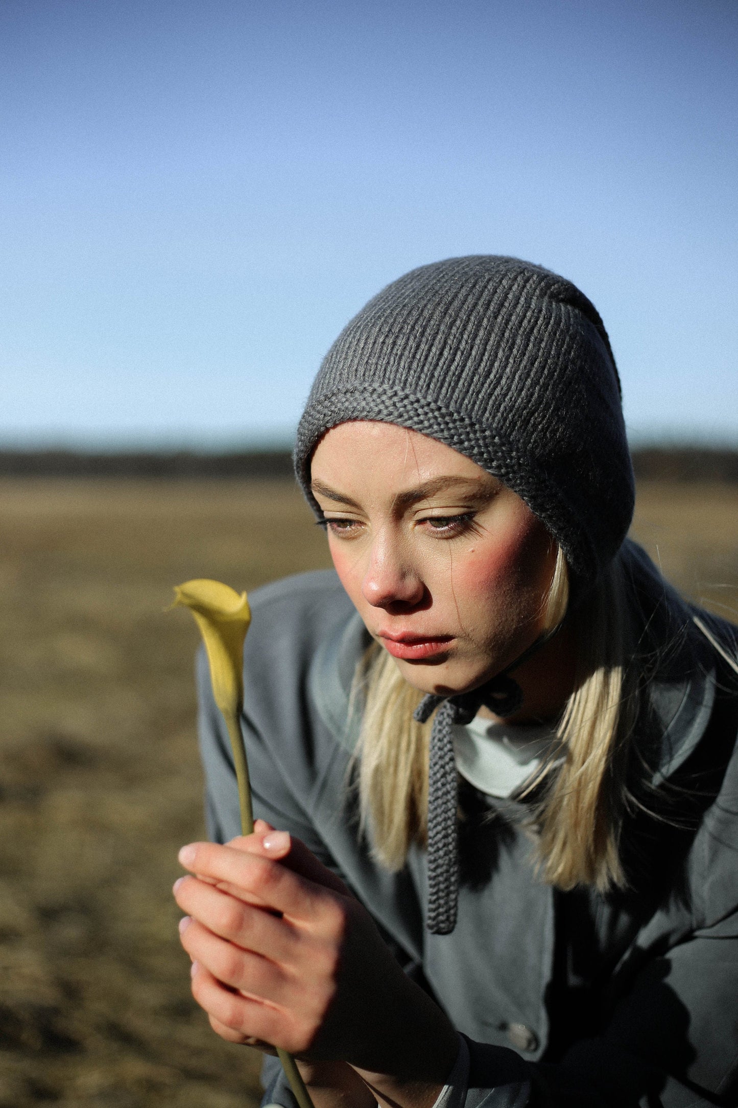 Hand-knitted Adult Bow Tie Bonnet hat in gray