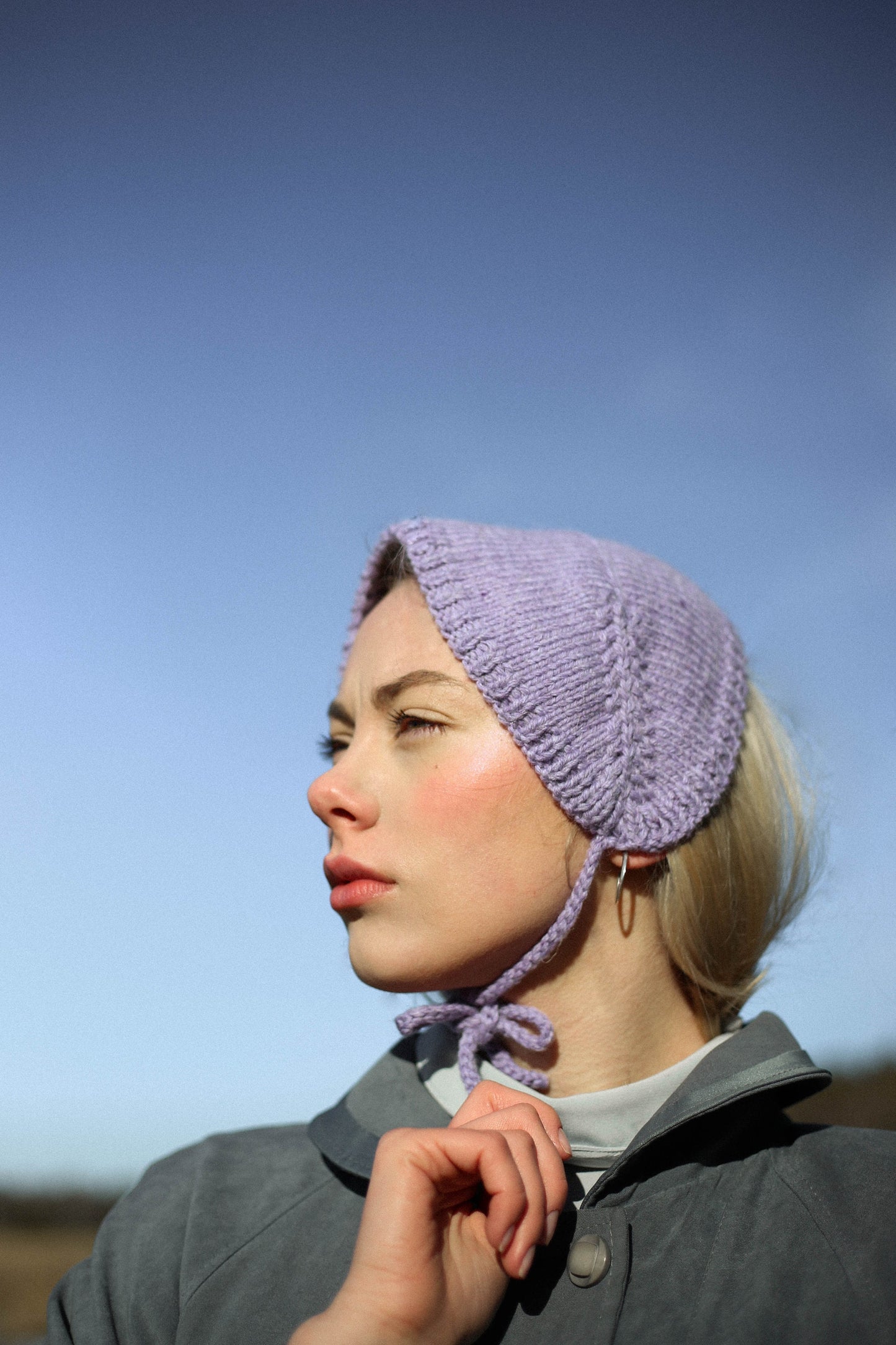 Hand - knitted Adult Bow Tie Bonnet in powder Lilac