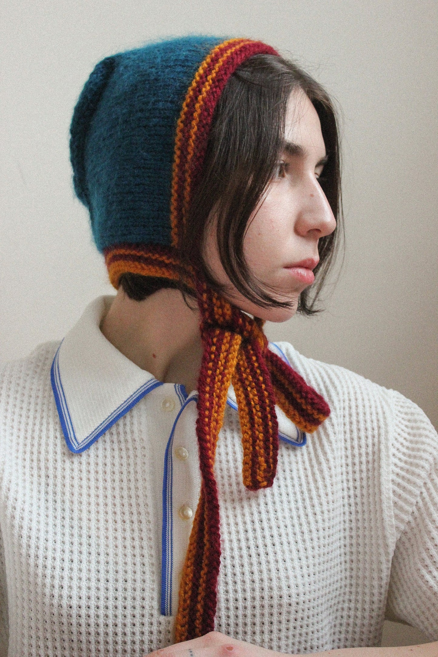 Hand-knitted Adult Bow Tie Bonnet hat in dull multicolor