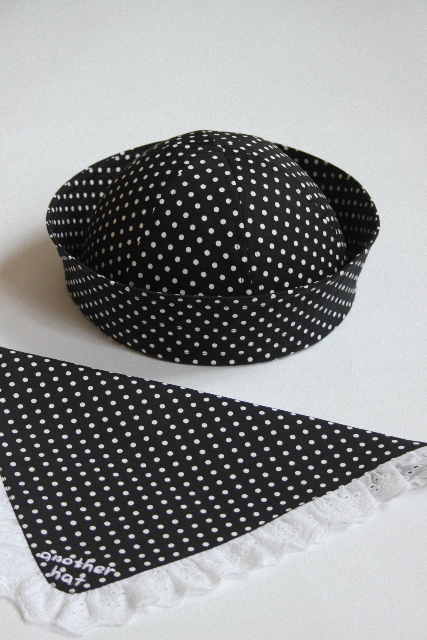 Polka Dot Marine Pillbox in Black